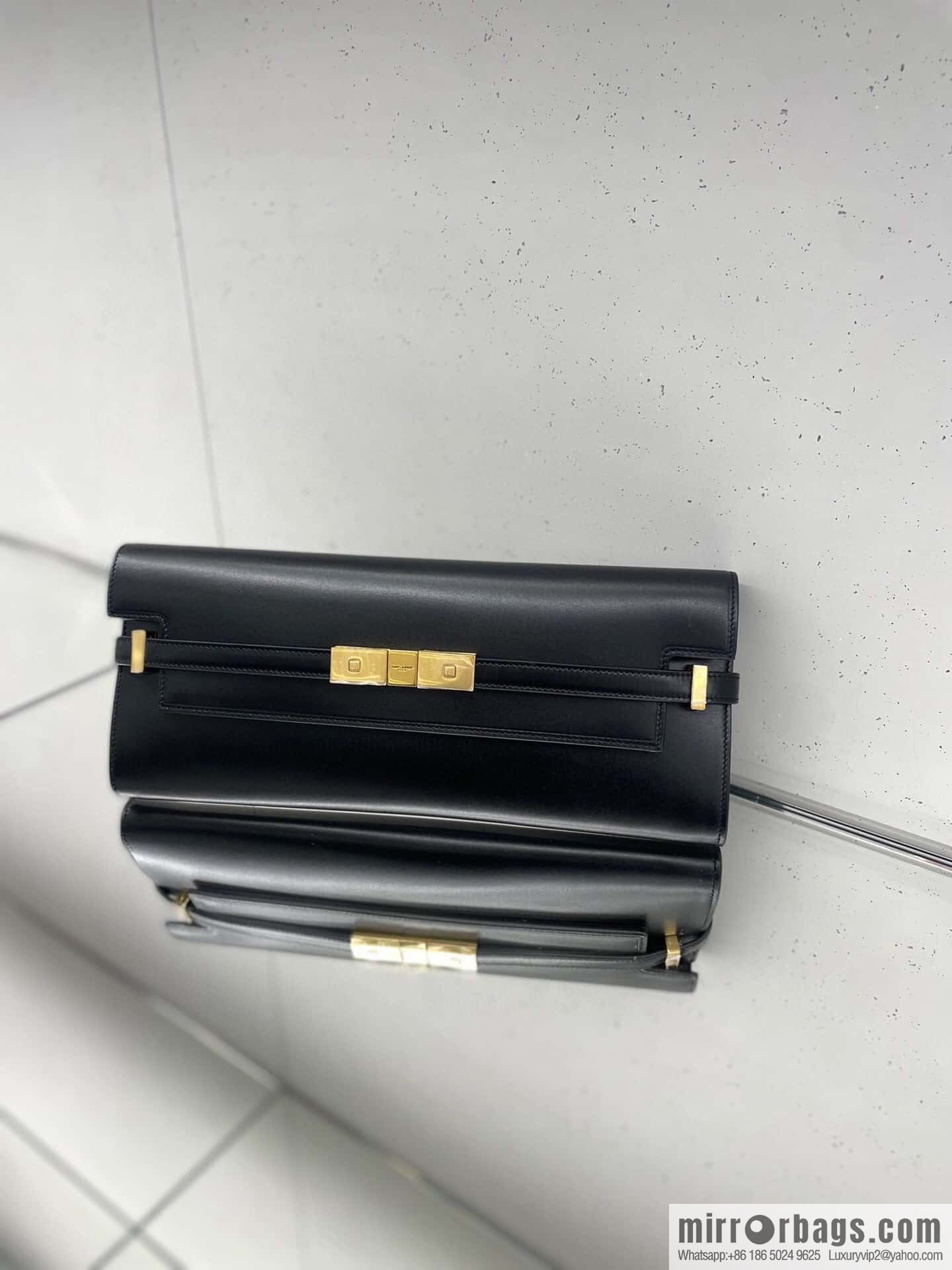 SAINT LAURENT YSL 𝗠𝗮𝗻𝗵𝗮𝘁𝘁𝗮𝗻 𝗖𝗹𝘂𝘁𝗰𝗵_ clutch bag 695949 black toothpick pattern
