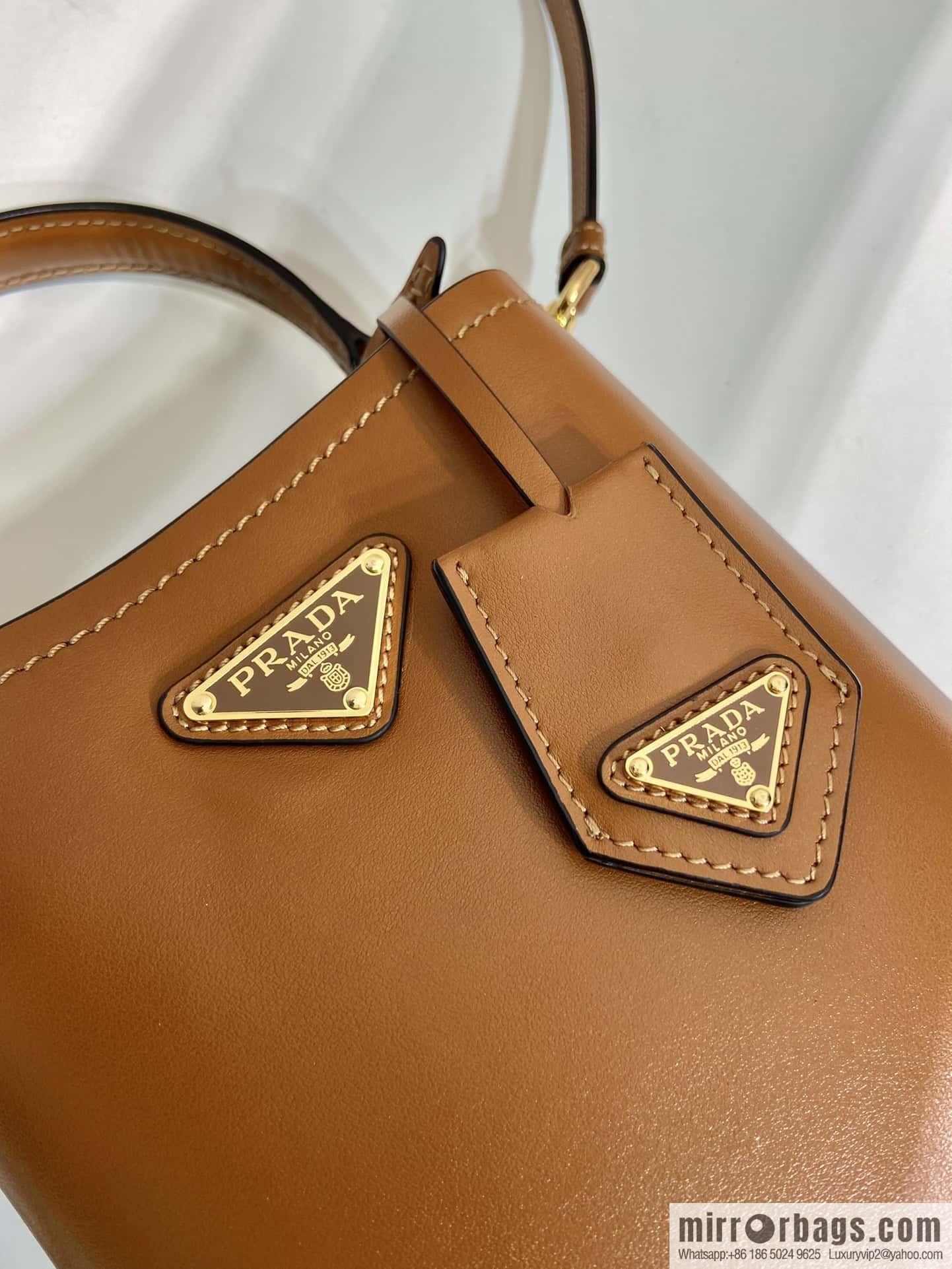 PRTADA Prada calfskin leather (fabric) bucket bag 1BA373