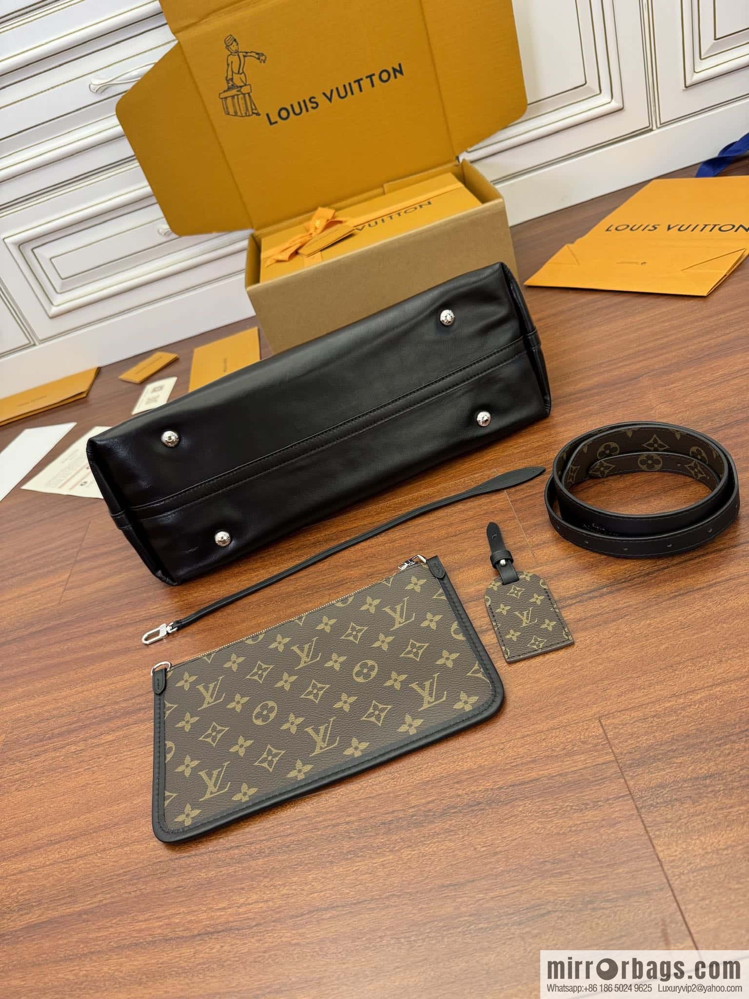LV M25143 New CARRYALL DARK medium handbag of the season