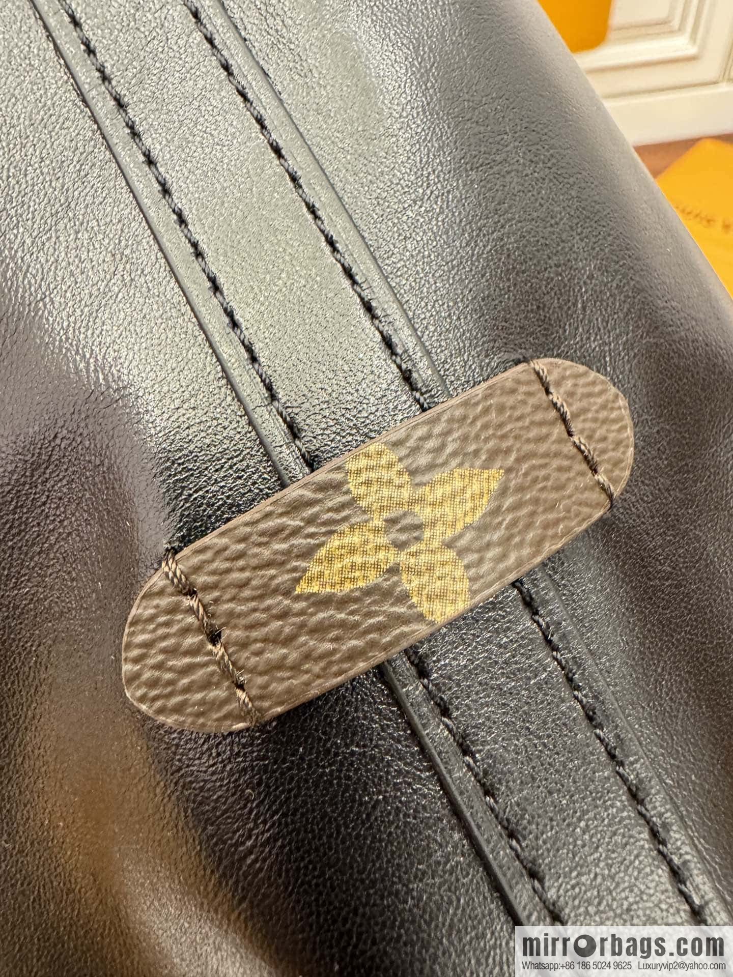 LV M25143 New CARRYALL DARK medium handbag of the season