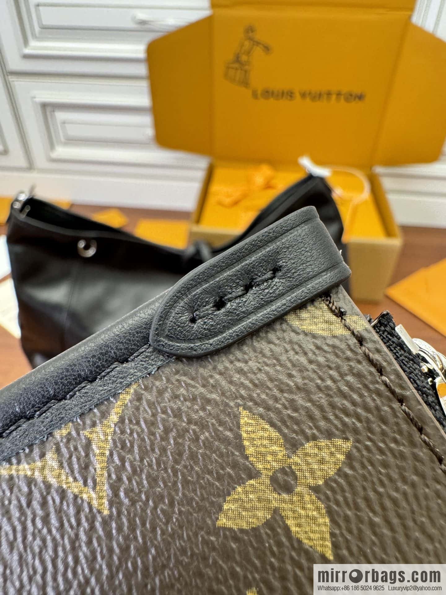 LV M25143 New CARRYALL DARK medium handbag of the season