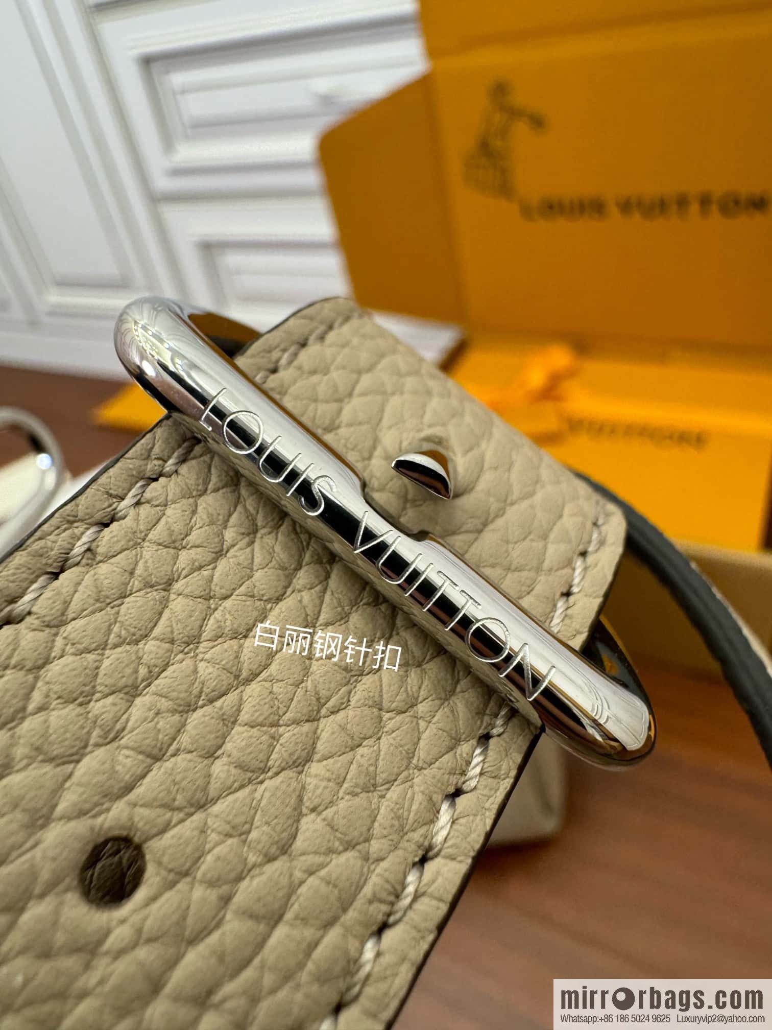 LV M24114 HAND IT ALL Small handbag
