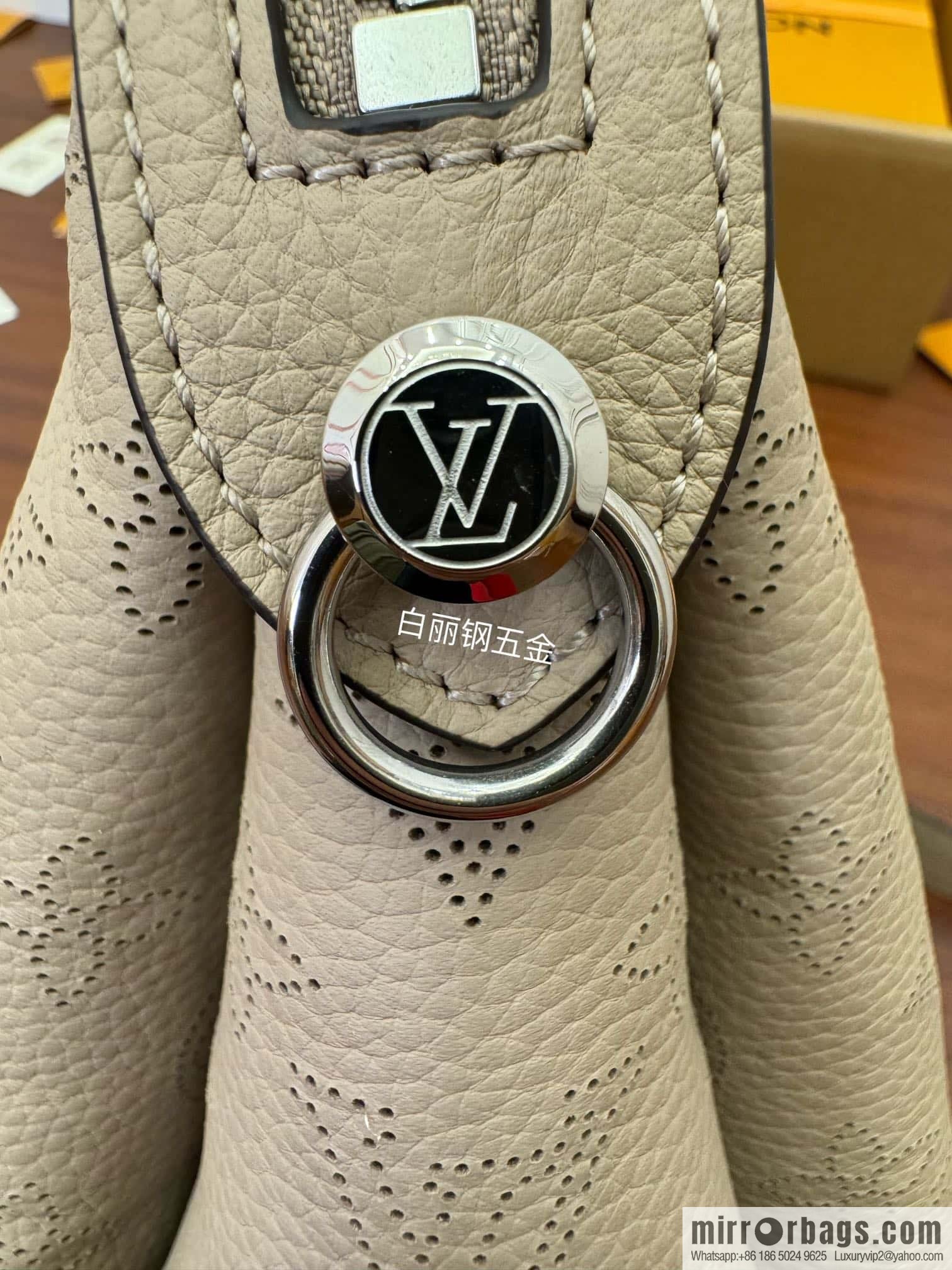 LV M24114 HAND IT ALL Small handbag