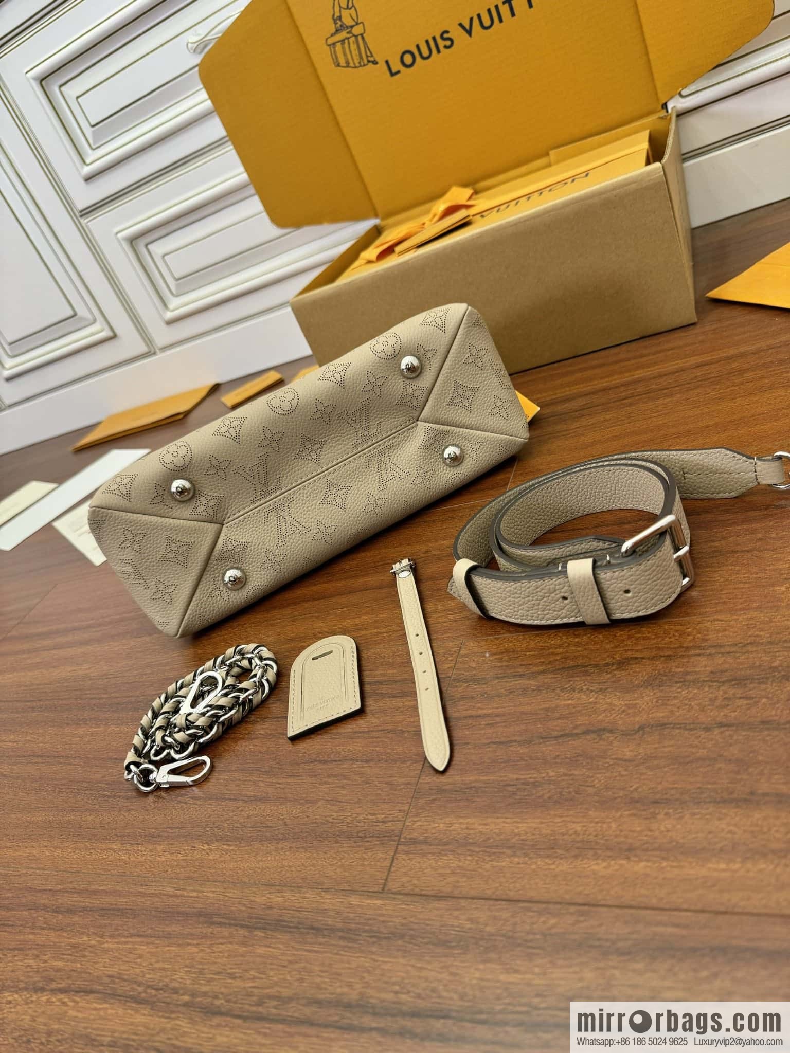 LV M24114 HAND IT ALL Small handbag