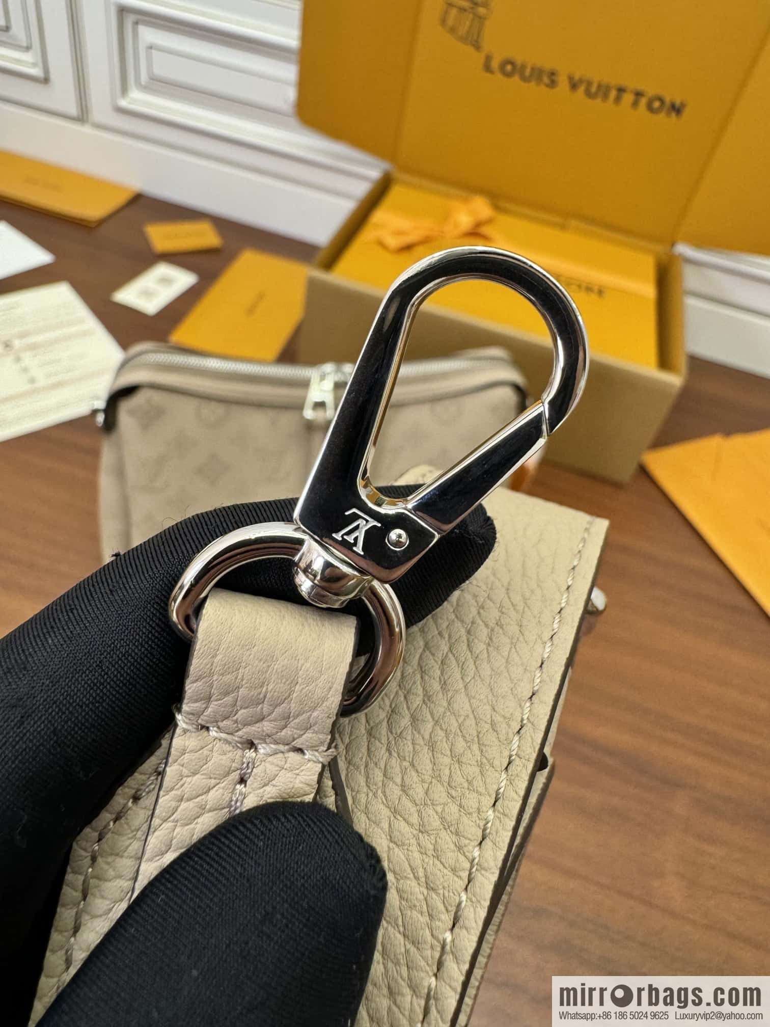 LV M24114 HAND IT ALL Small handbag