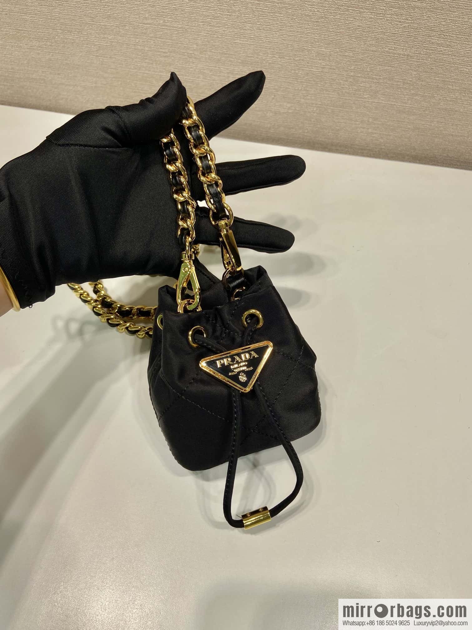 PRADA 🎉 embroidered grid small bucket 🎉 1NR016