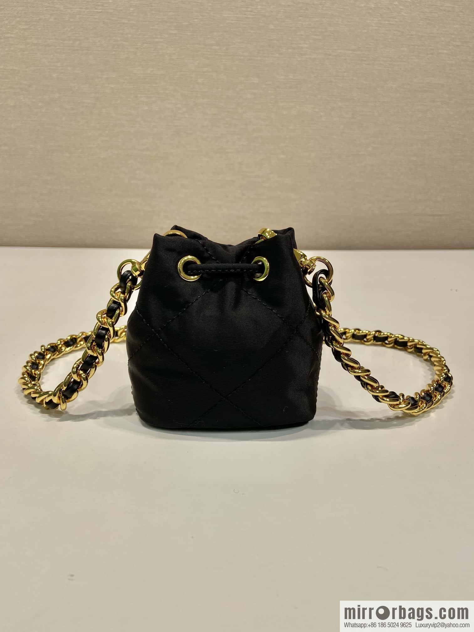 PRADA 🎉 embroidered grid small bucket 🎉 1NR016