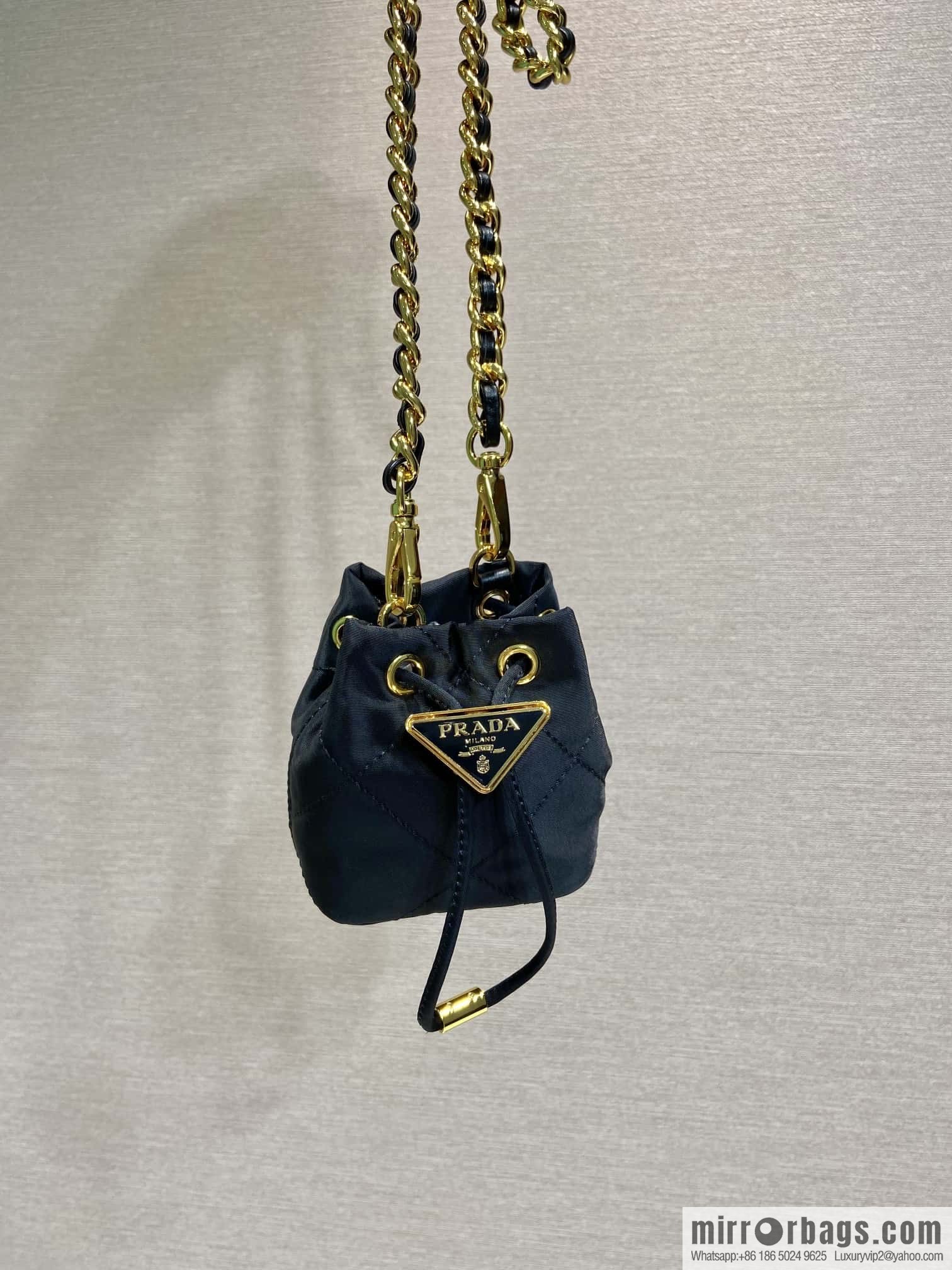 PRADA 🎉 embroidered grid small bucket 🎉 1NR016
