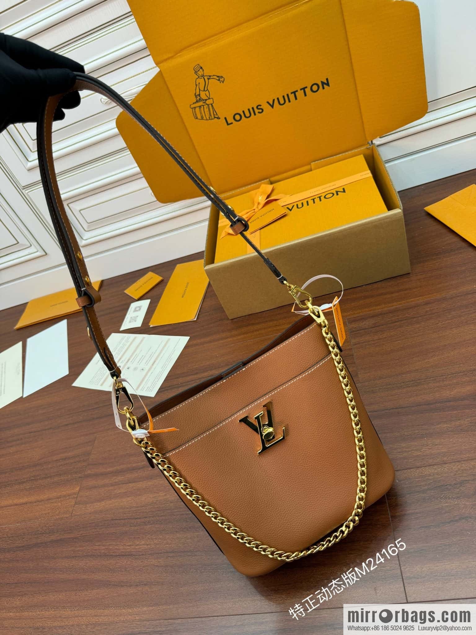 LV M24165 Lock and Walk