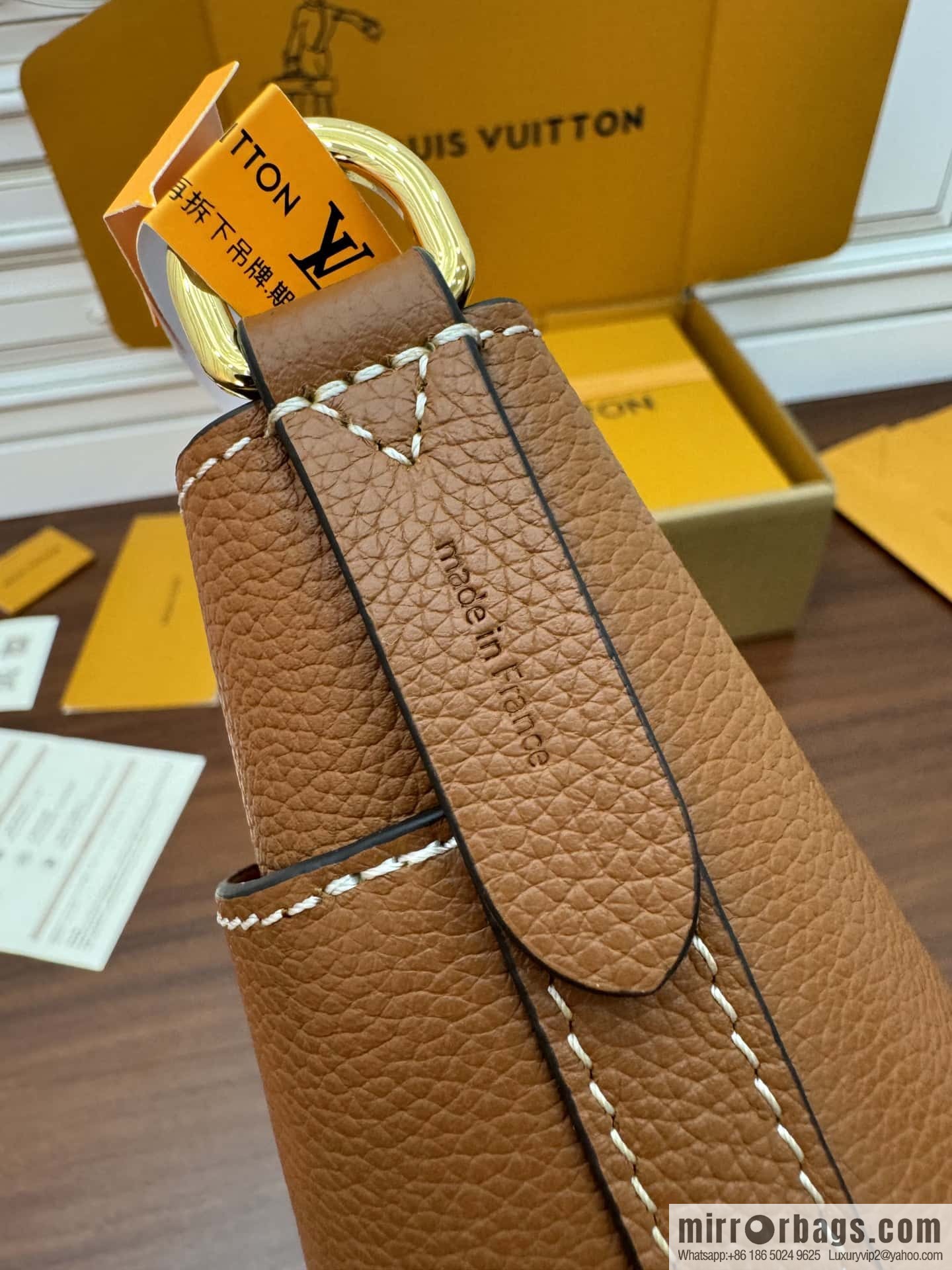 LV M24165 Lock and Walk