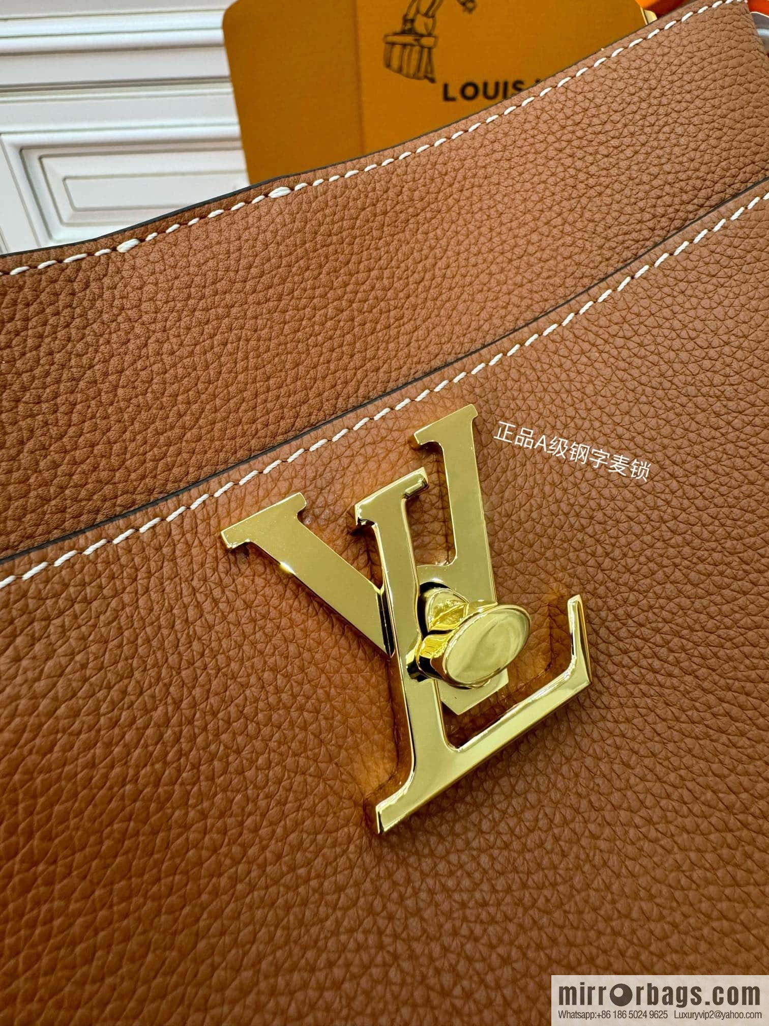 LV M24165 Lock and Walk
