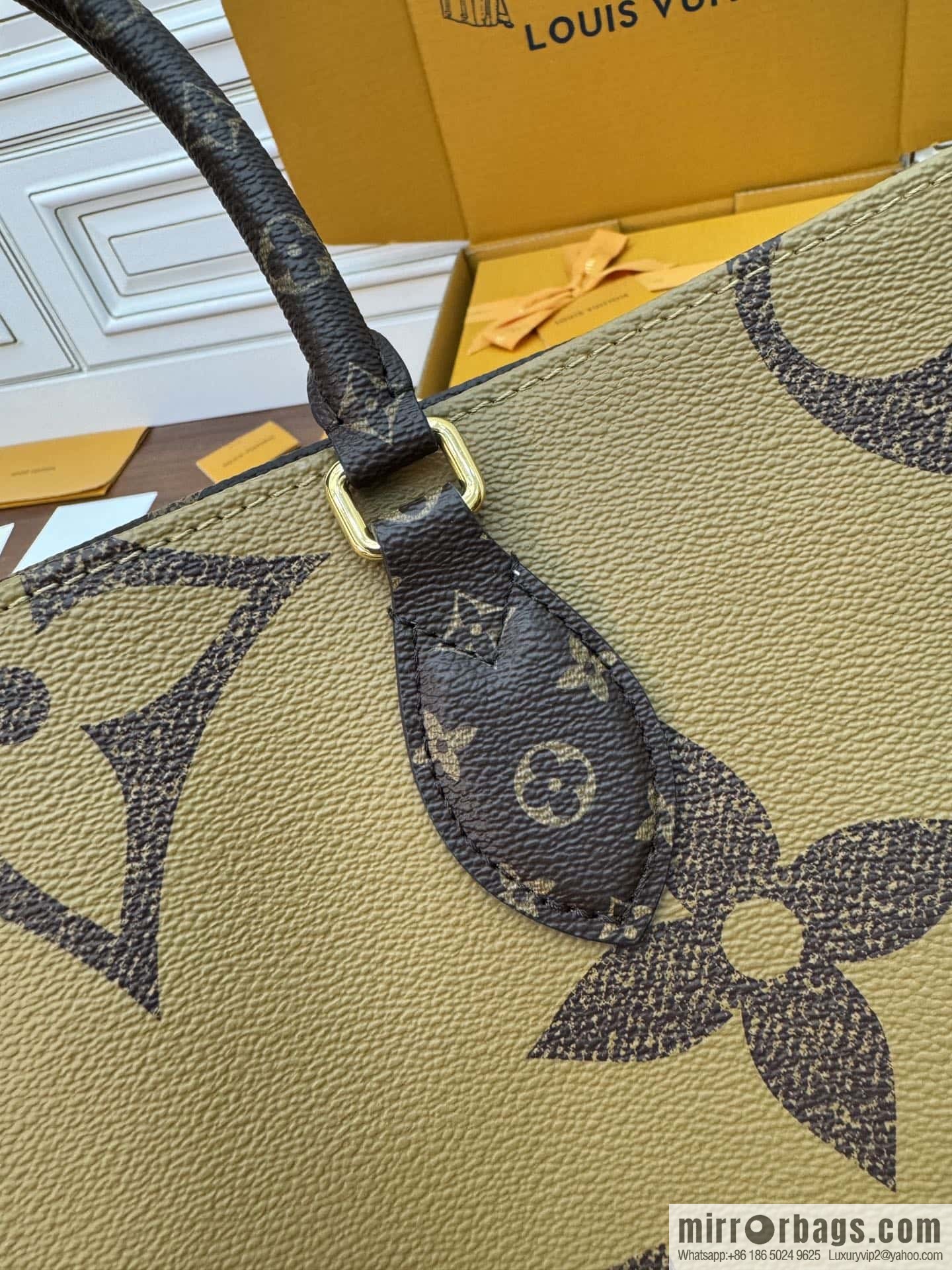 LV M46823 ONTHEGO VOYAGE BAG