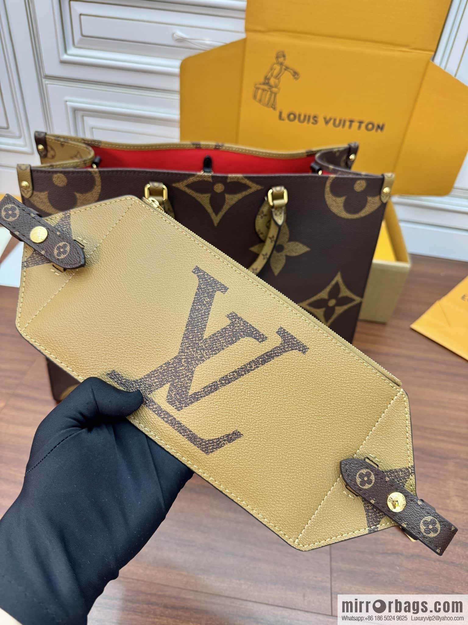 LV M46823 ONTHEGO VOYAGE BAG