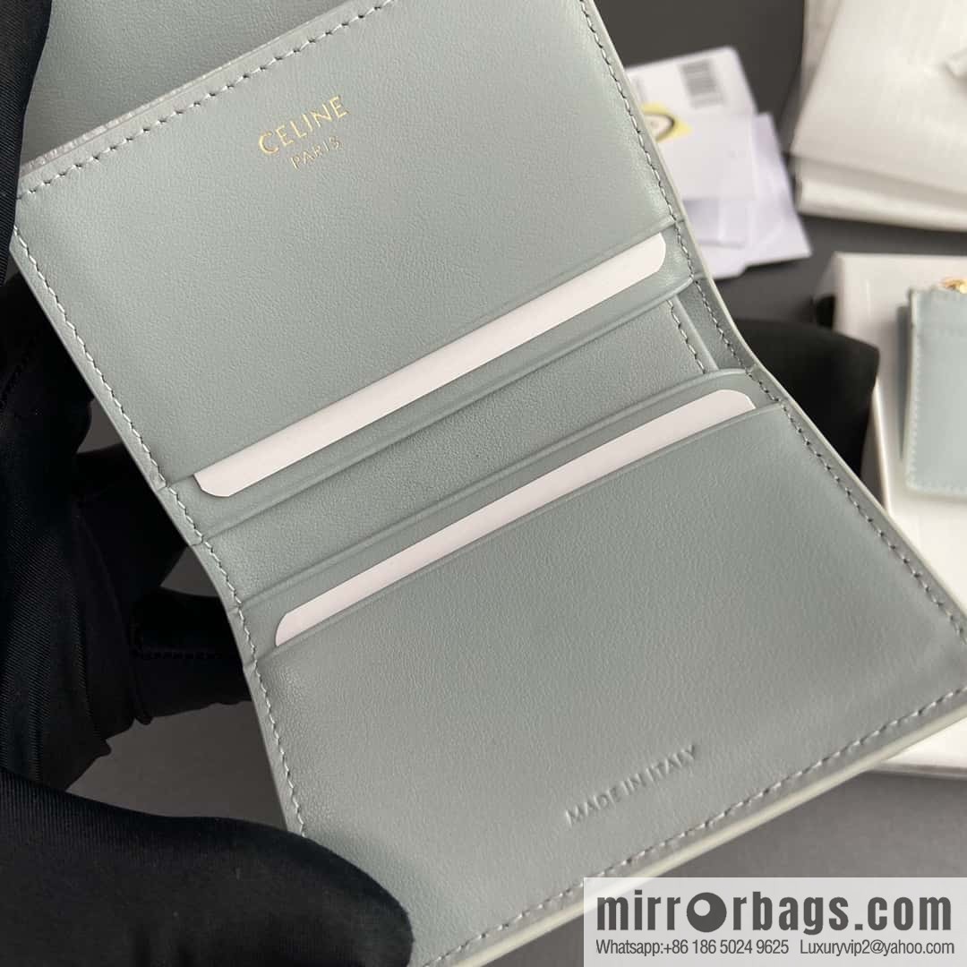 Celine TRIOMPHE glossy leather (fabric) short wallet 10l653DS3.04LU652