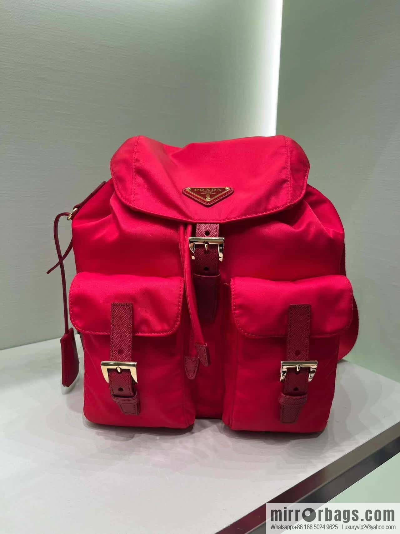 Prada 1BZ677 gold buckle classic backpack
