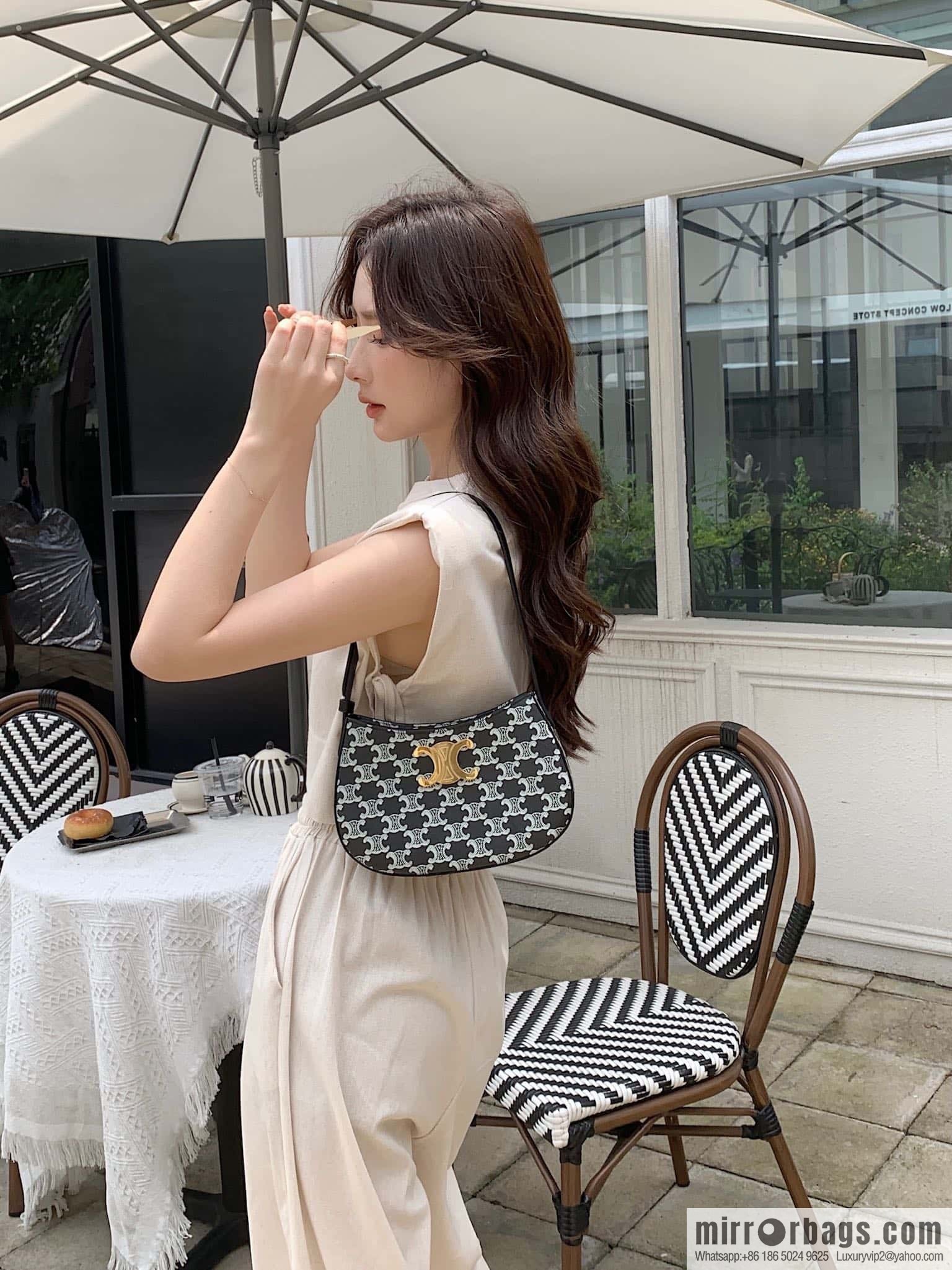 CELINE TILI medium logo printed cow leather (fabric) handbag 115702 black and white flower