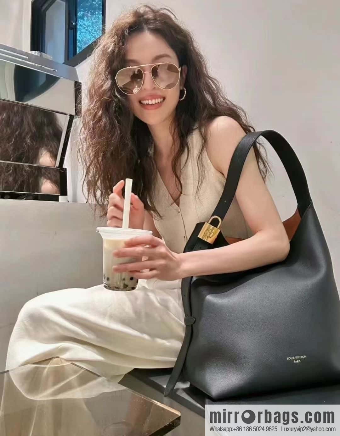 LV M24856 LOW KEY HOBO medium handbag