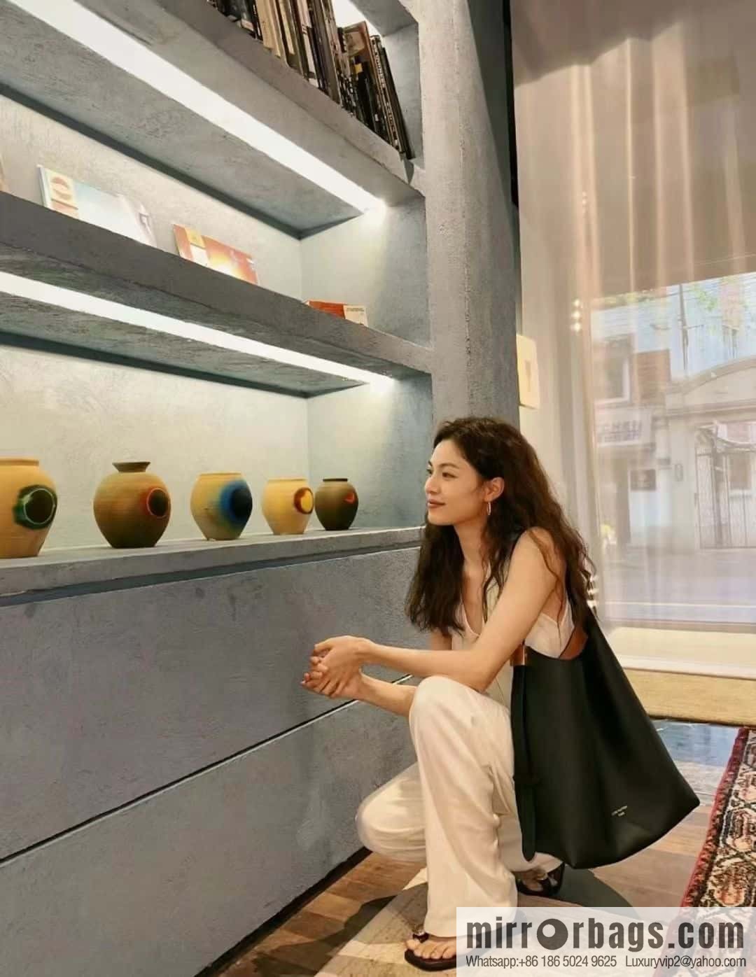 LV M24856 LOW KEY HOBO medium handbag