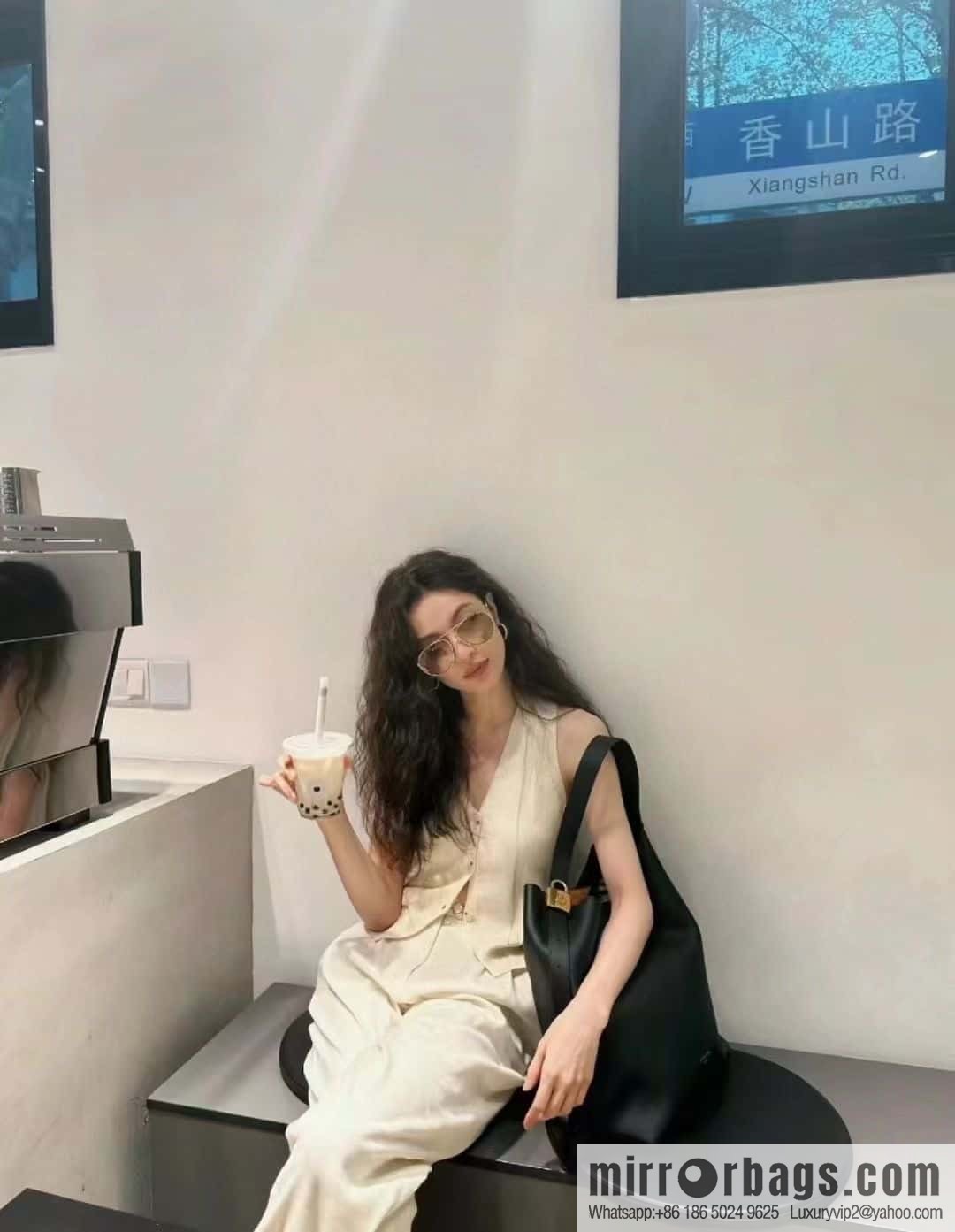 LV M24856 LOW KEY HOBO medium handbag