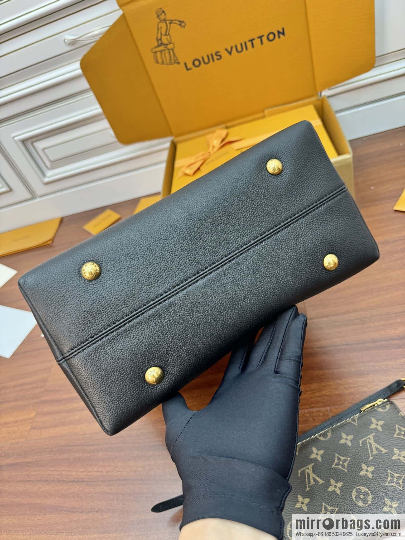 LV M24856 LOW KEY HOBO medium handbag