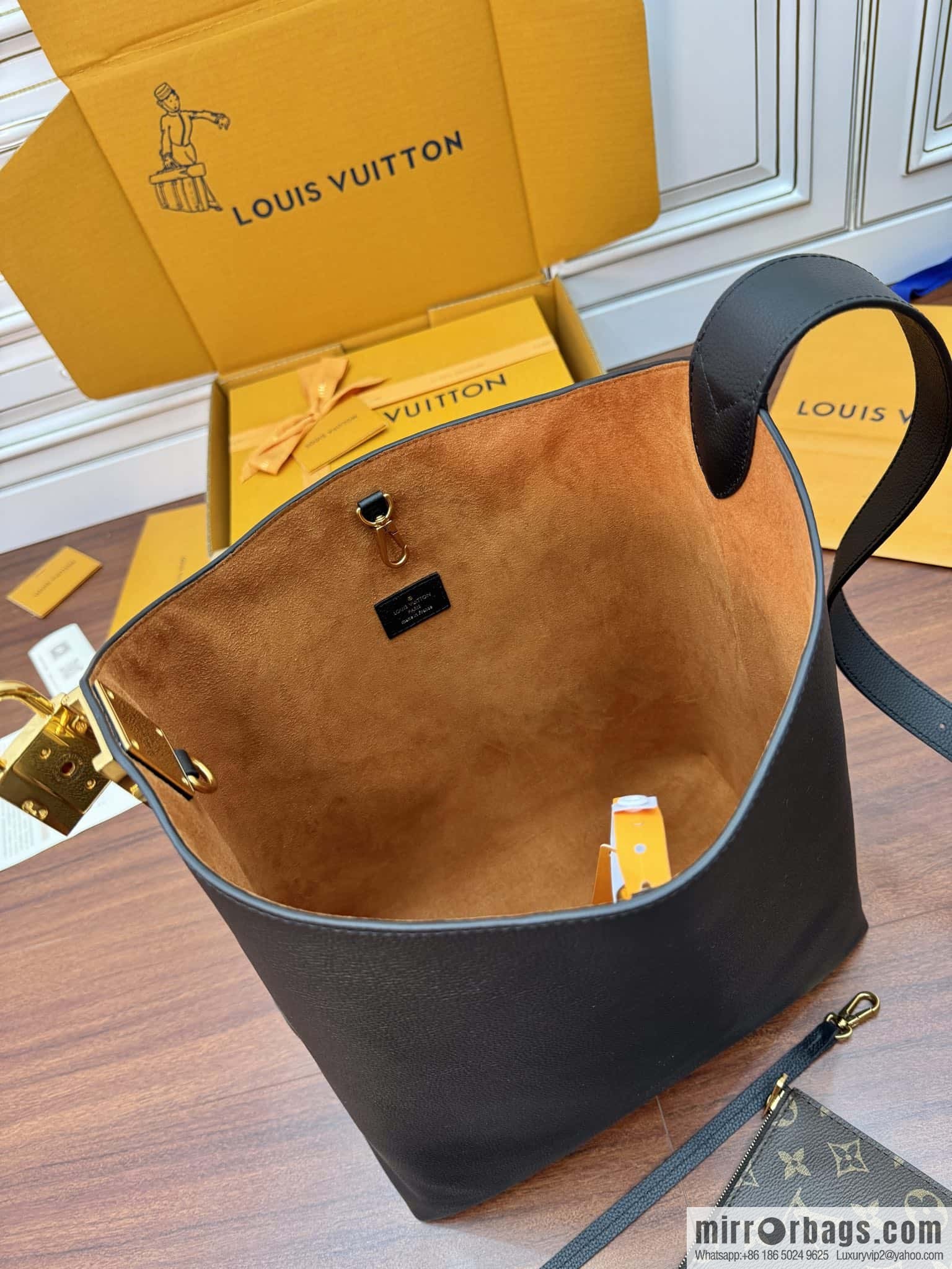 LV M24856 LOW KEY HOBO medium handbag