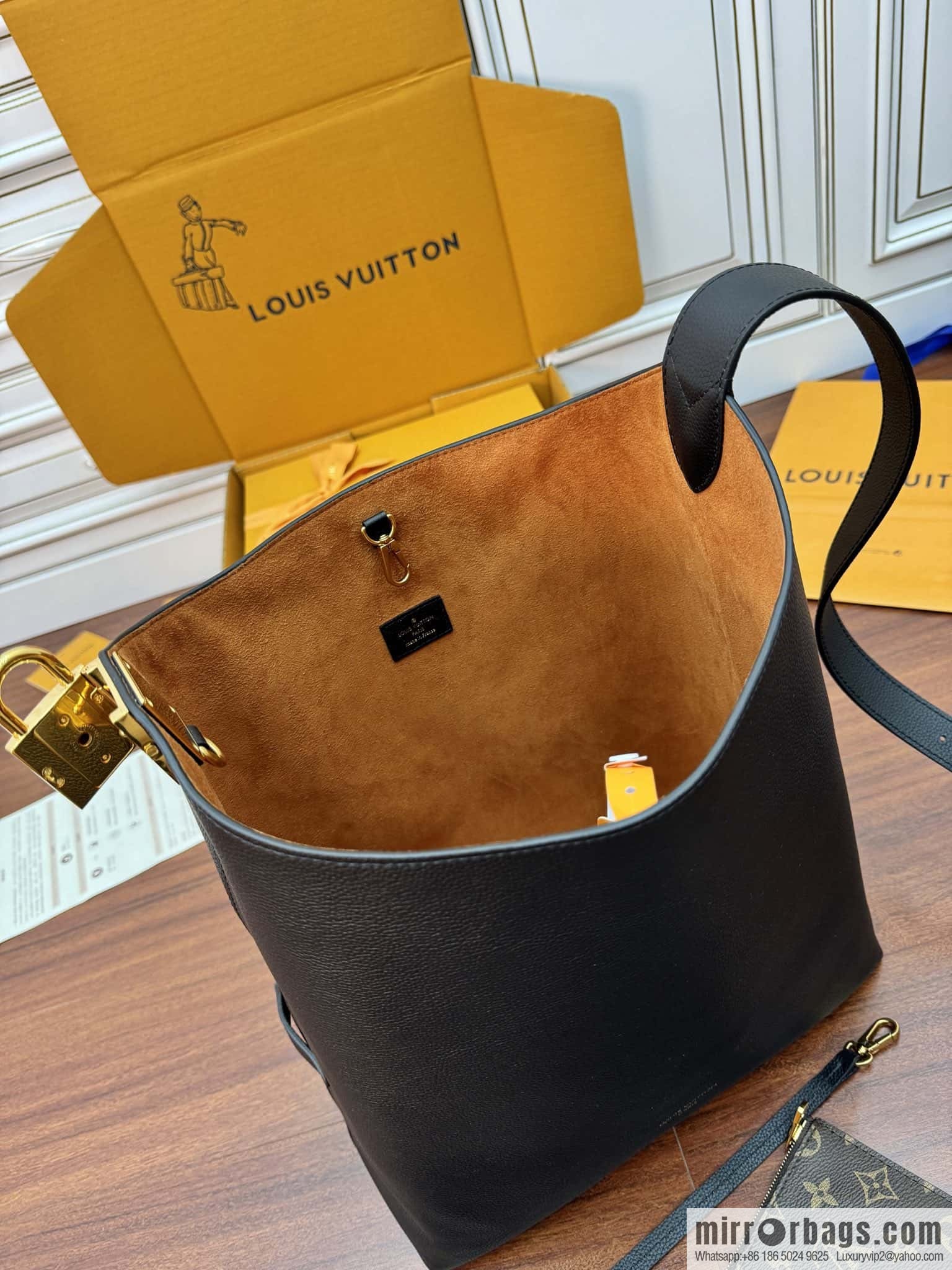 LV M24856 LOW KEY HOBO medium handbag