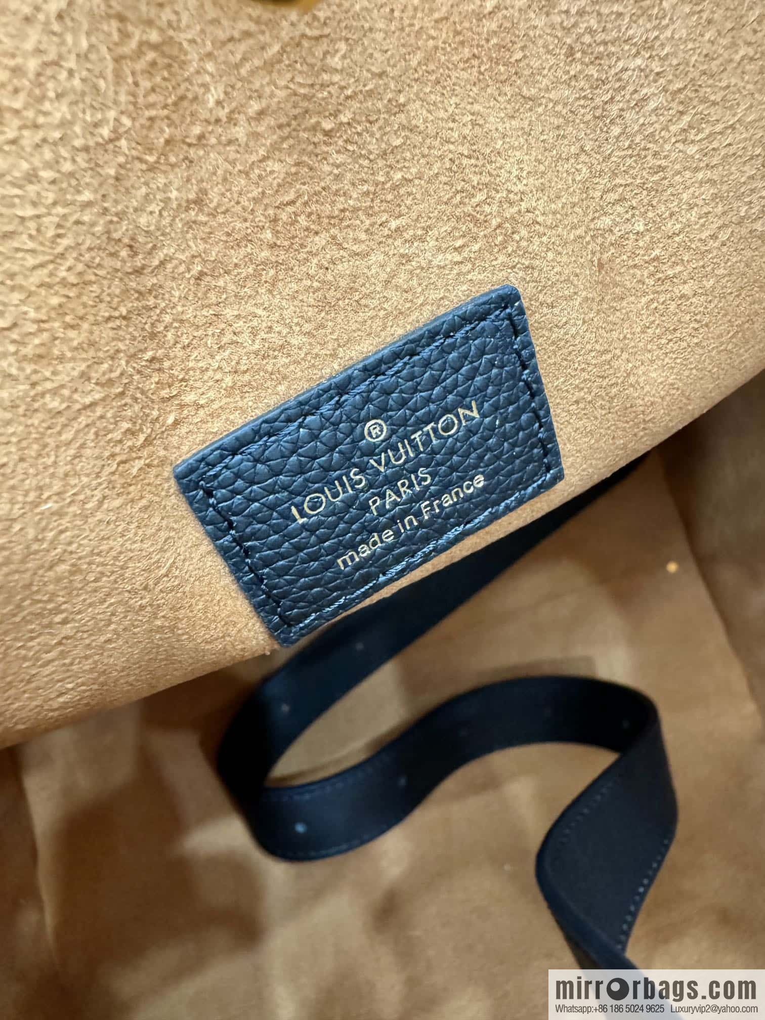 LV M24856 LOW KEY HOBO medium handbag