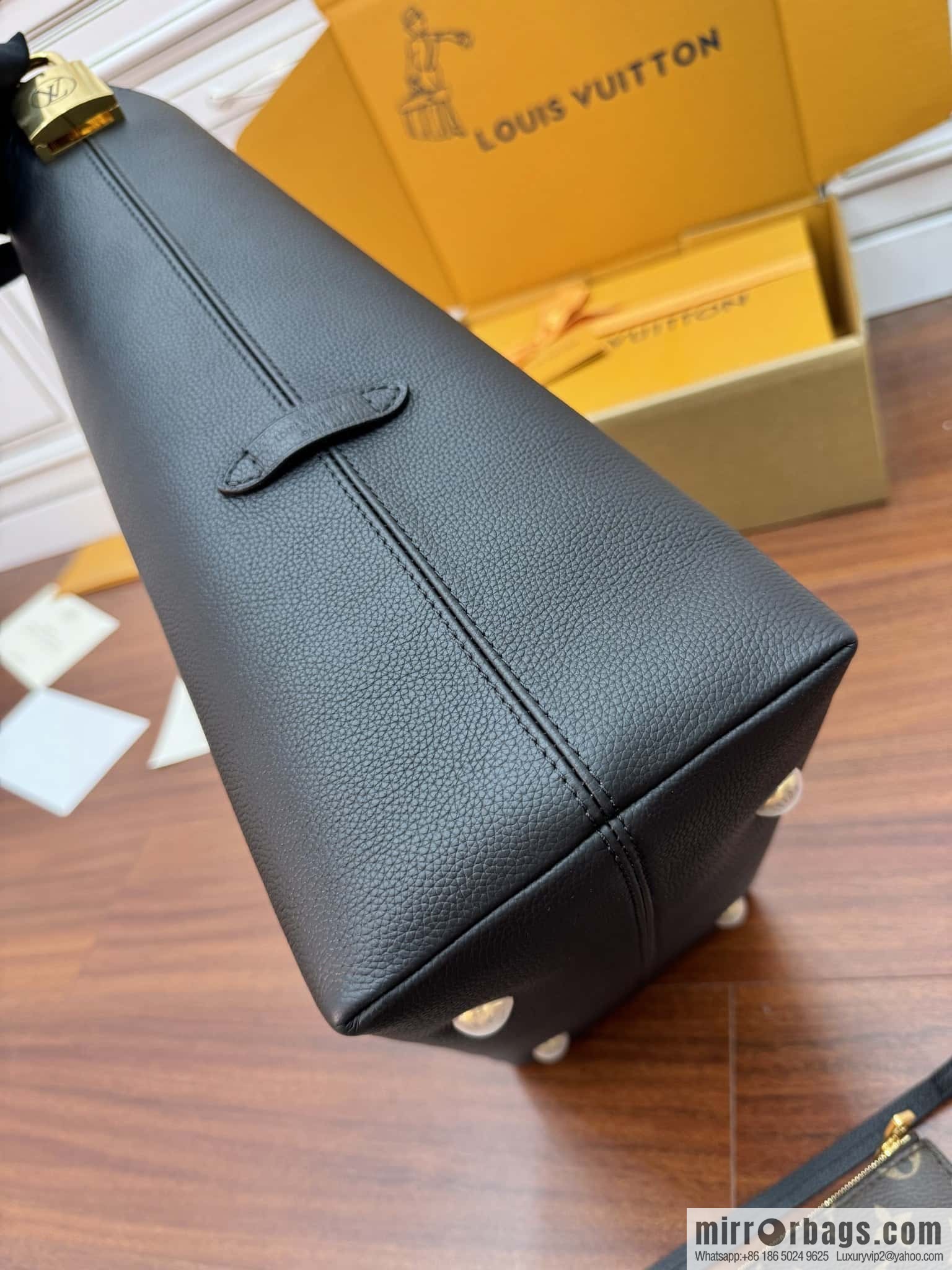 LV M24856 LOW KEY HOBO medium handbag