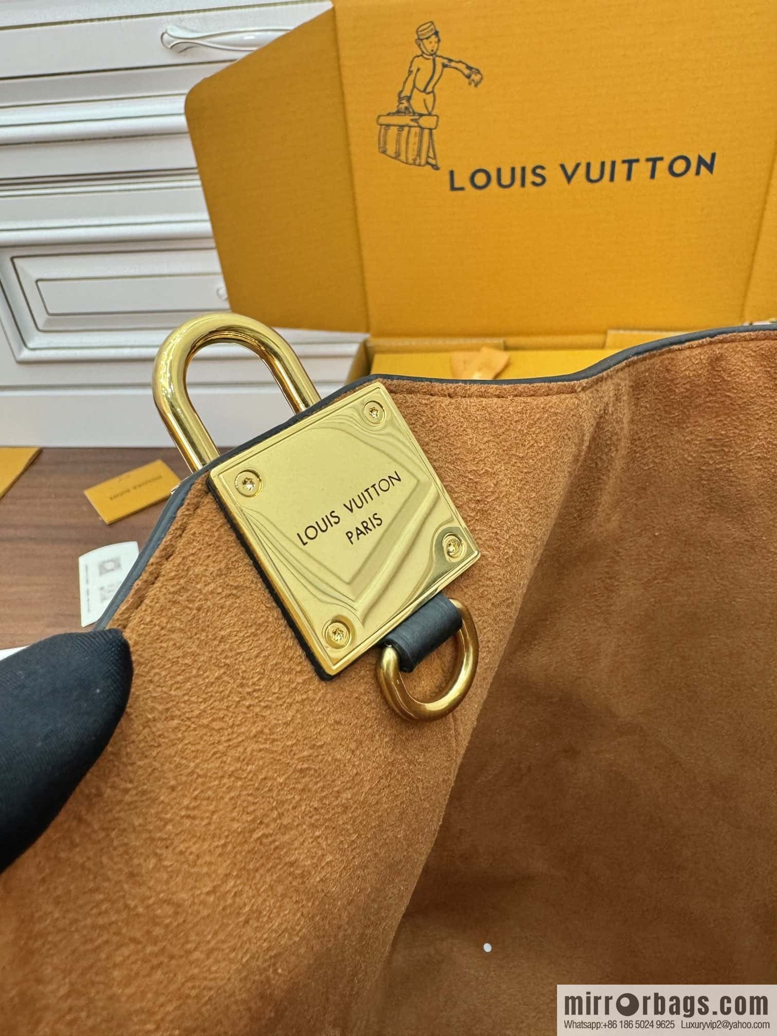 LV M24856 LOW KEY HOBO medium handbag