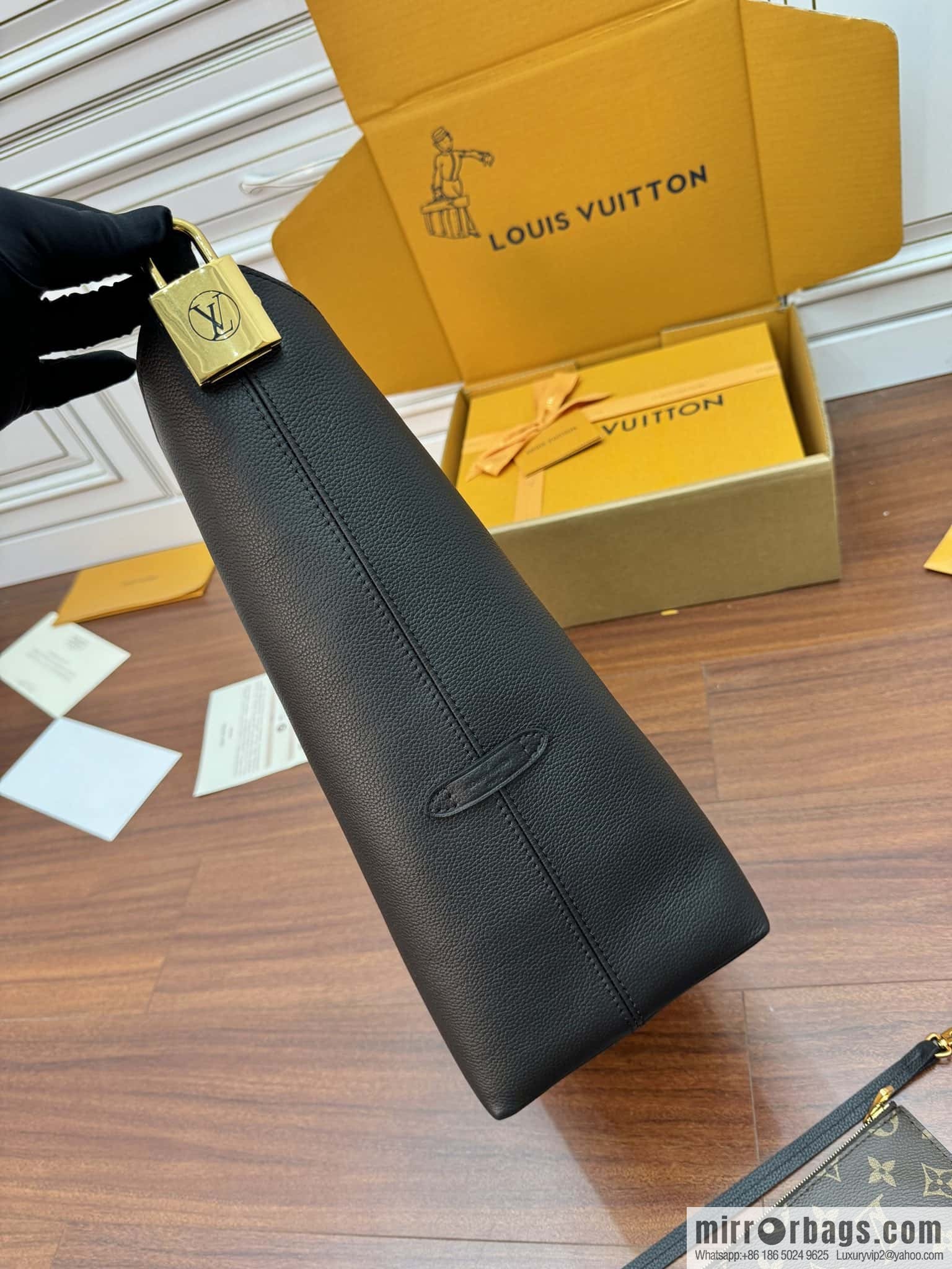 LV M24856 LOW KEY HOBO medium handbag