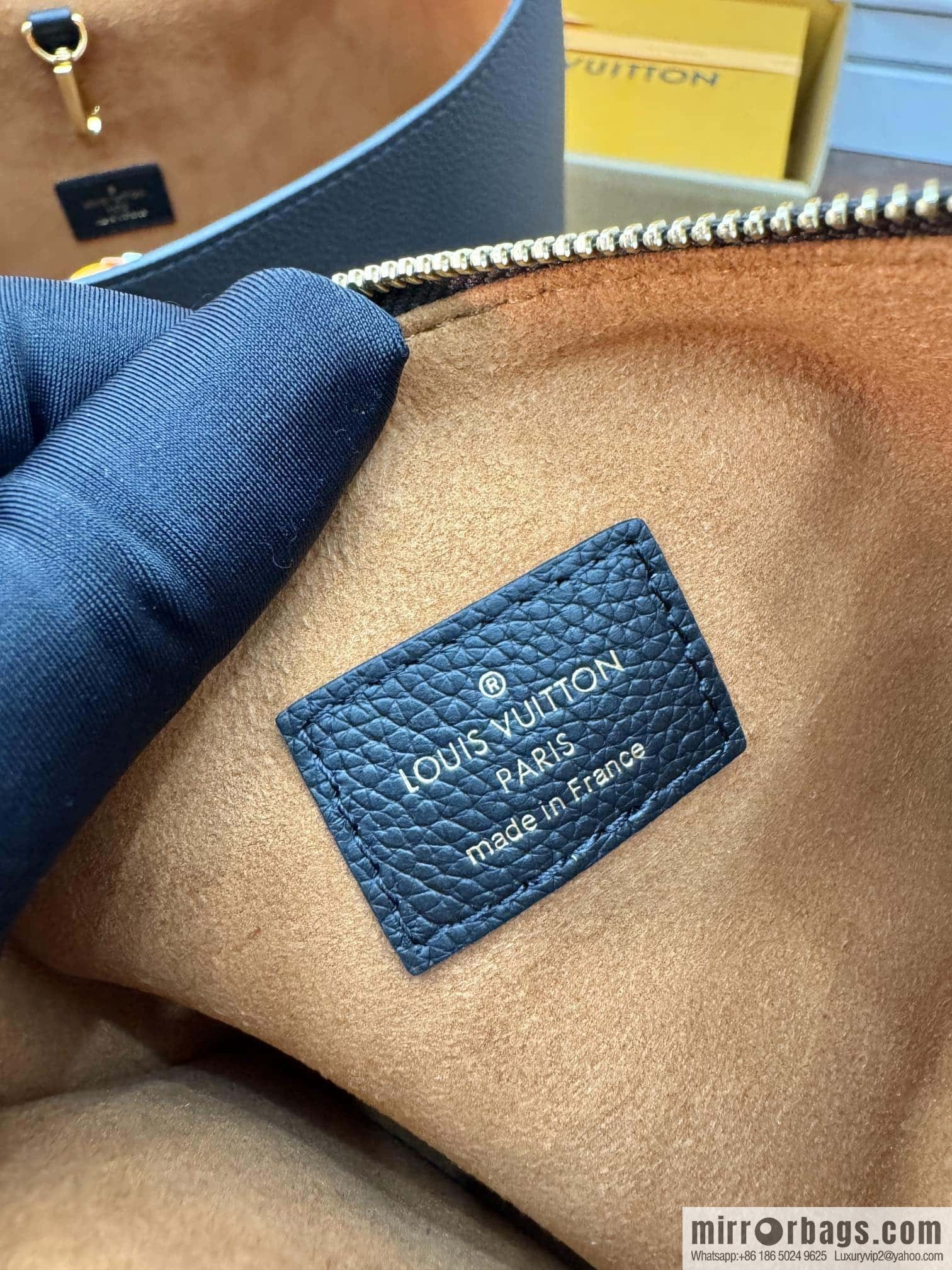LV M24856 LOW KEY HOBO medium handbag