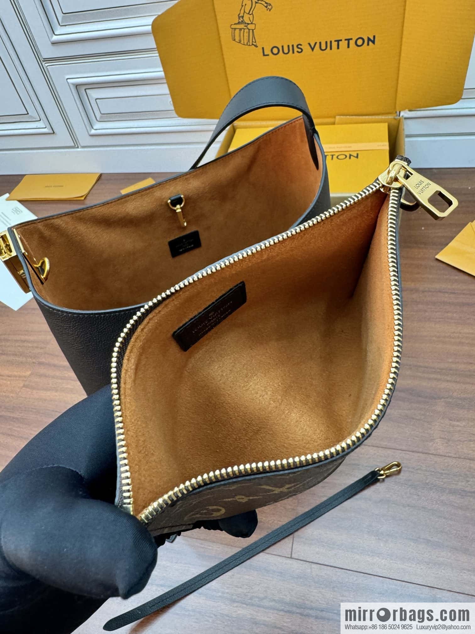 LV M24856 LOW KEY HOBO medium handbag