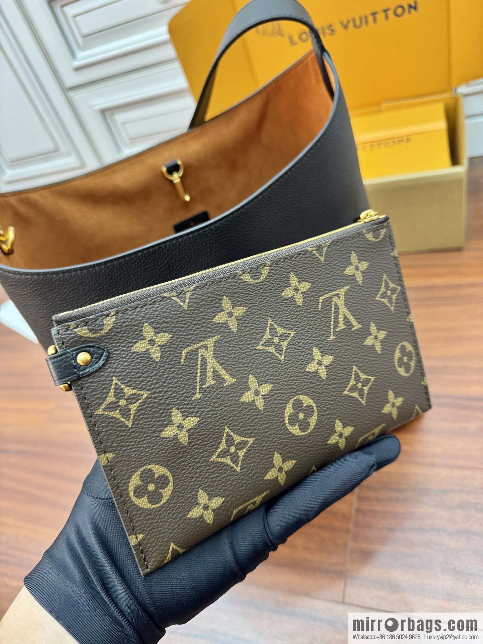 LV M24856 LOW KEY HOBO medium handbag