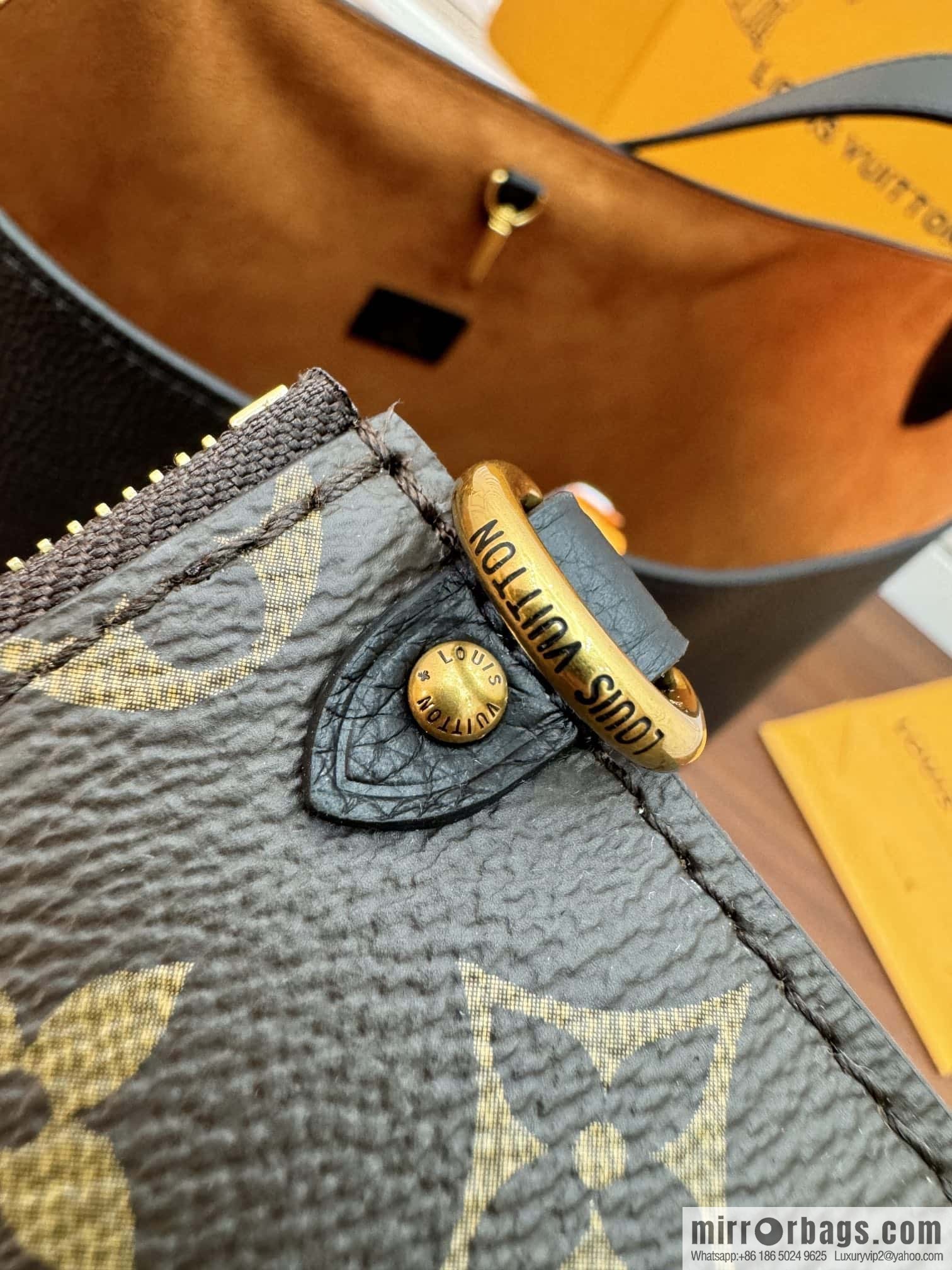LV M24856 LOW KEY HOBO medium handbag
