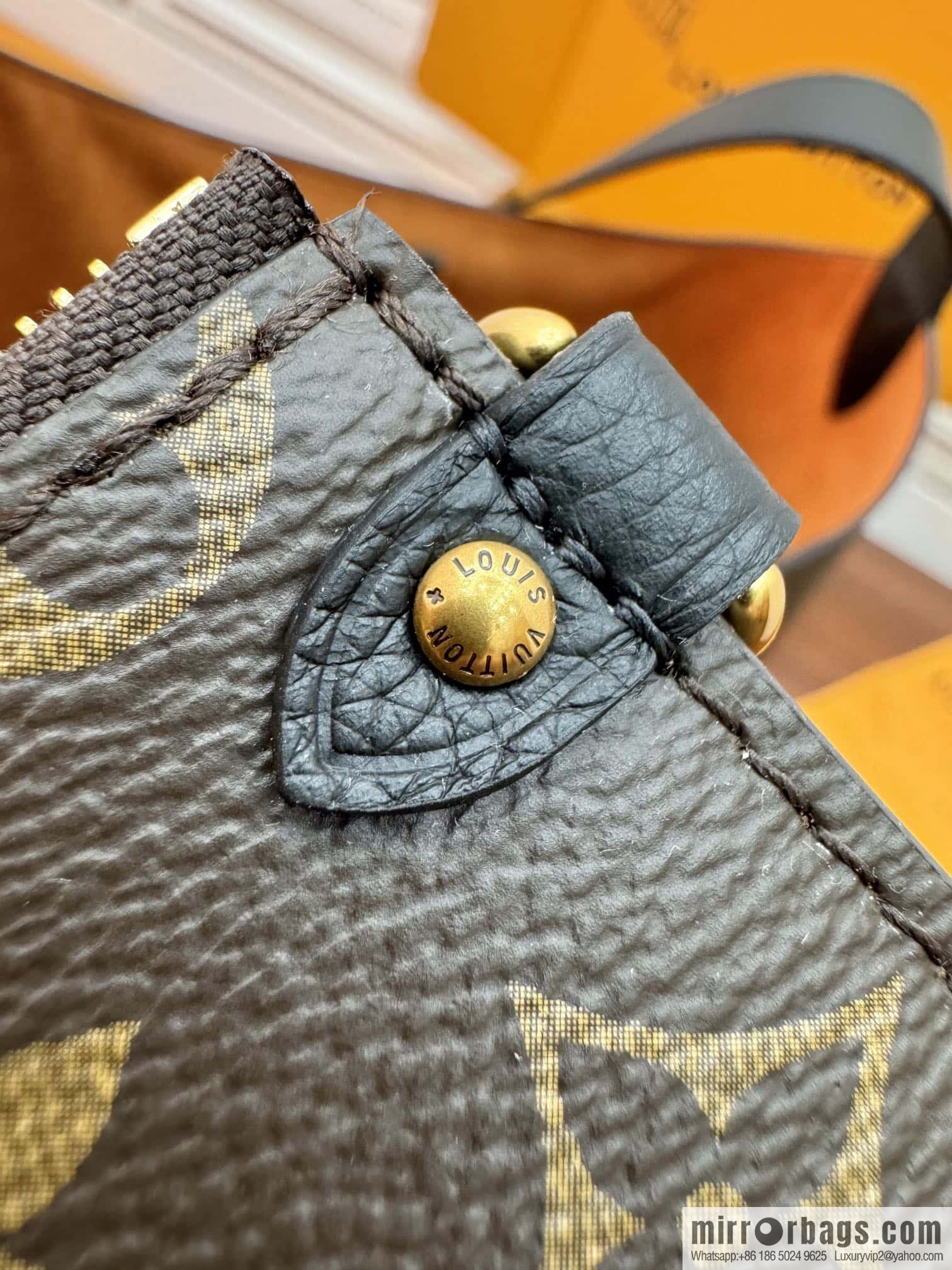LV M24856 LOW KEY HOBO medium handbag