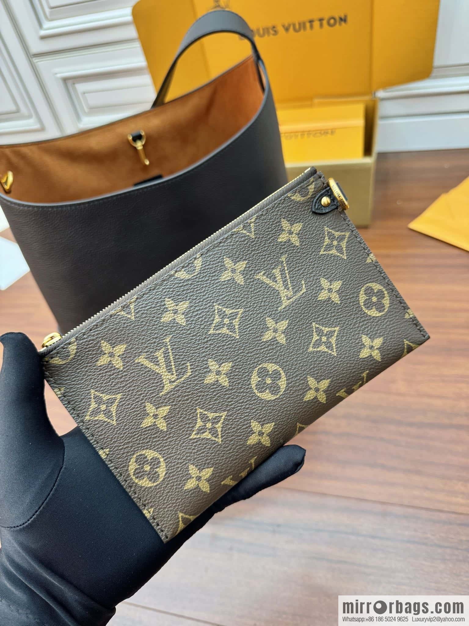 LV M24856 LOW KEY HOBO medium handbag