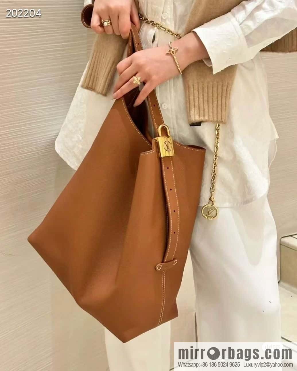 LV M24974 LOW KEY HOBO medium handbag