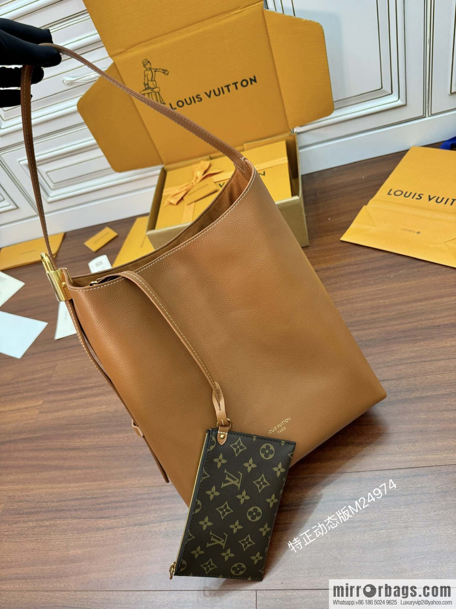 LV M24974 LOW KEY HOBO medium handbag