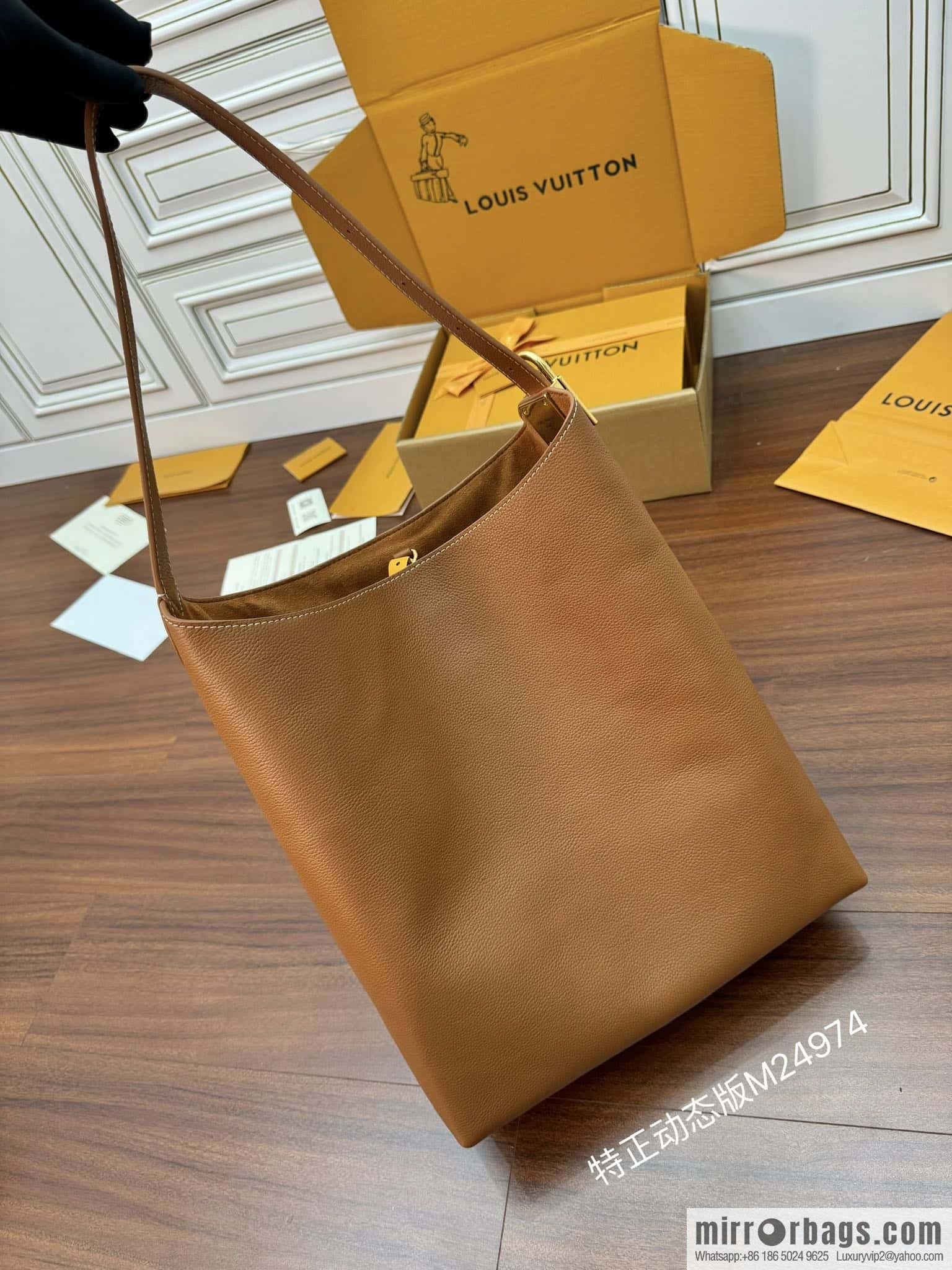 LV M24974 LOW KEY HOBO medium handbag