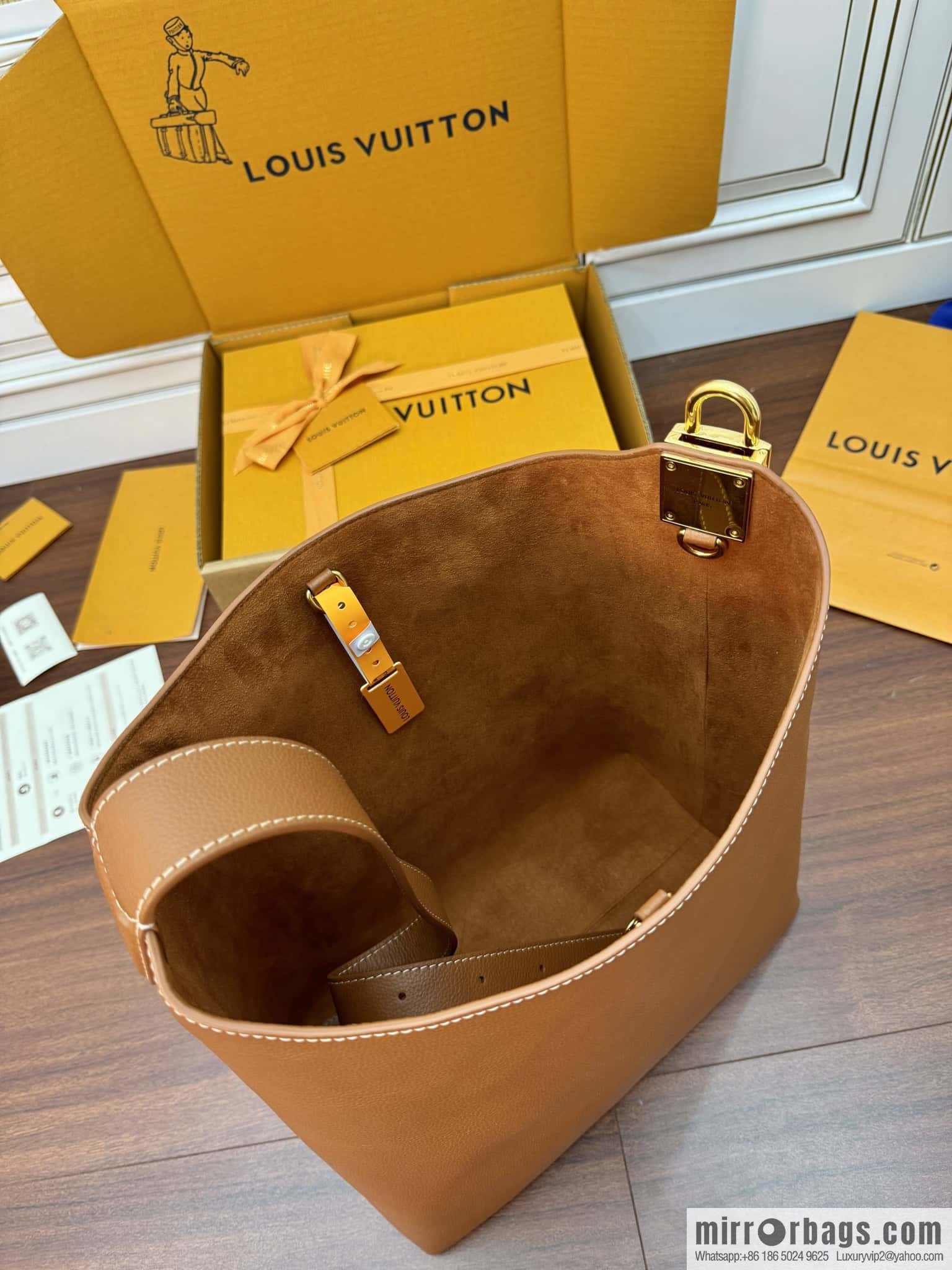 LV M24974 LOW KEY HOBO medium handbag