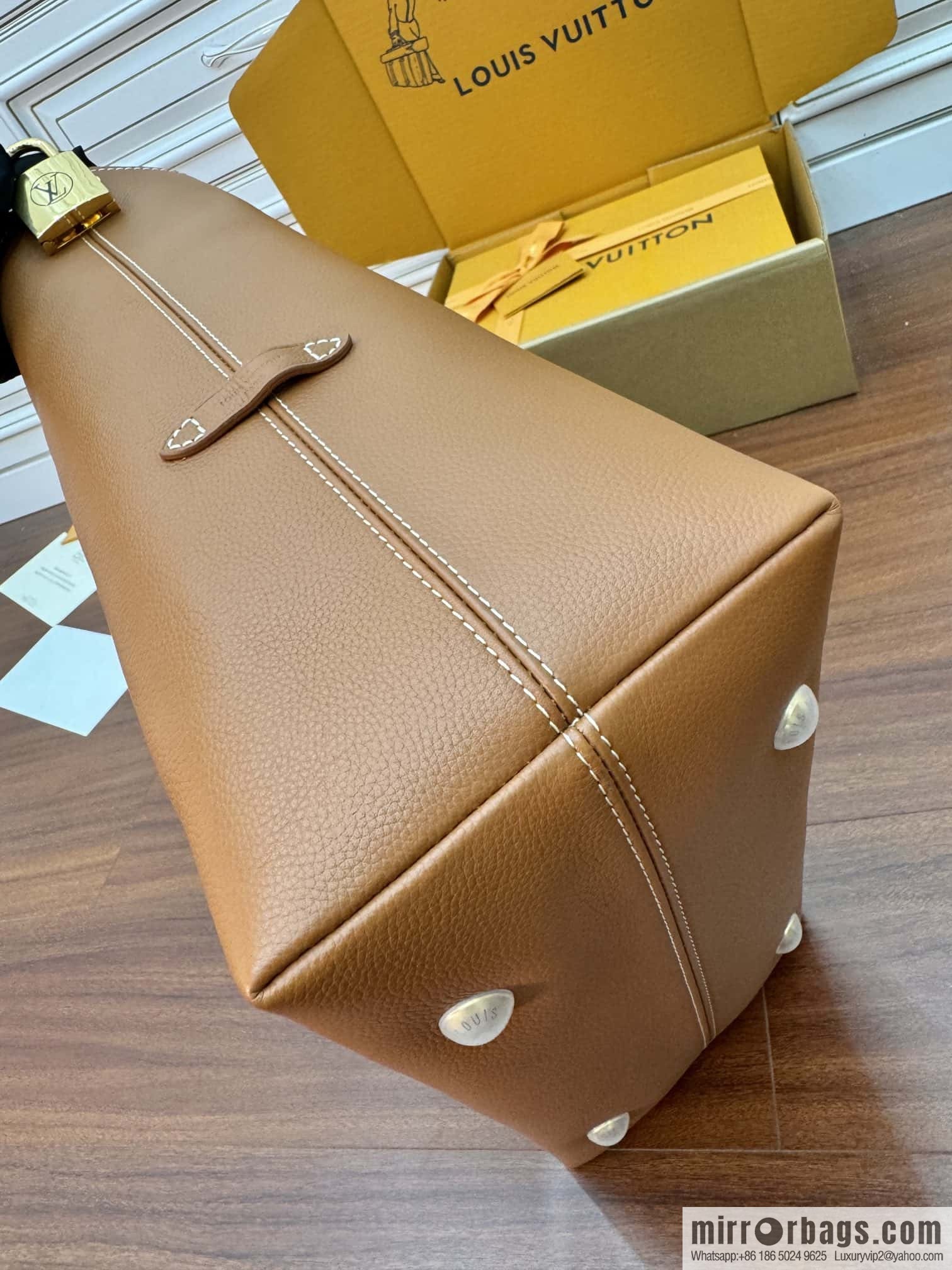 LV M24974 LOW KEY HOBO medium handbag