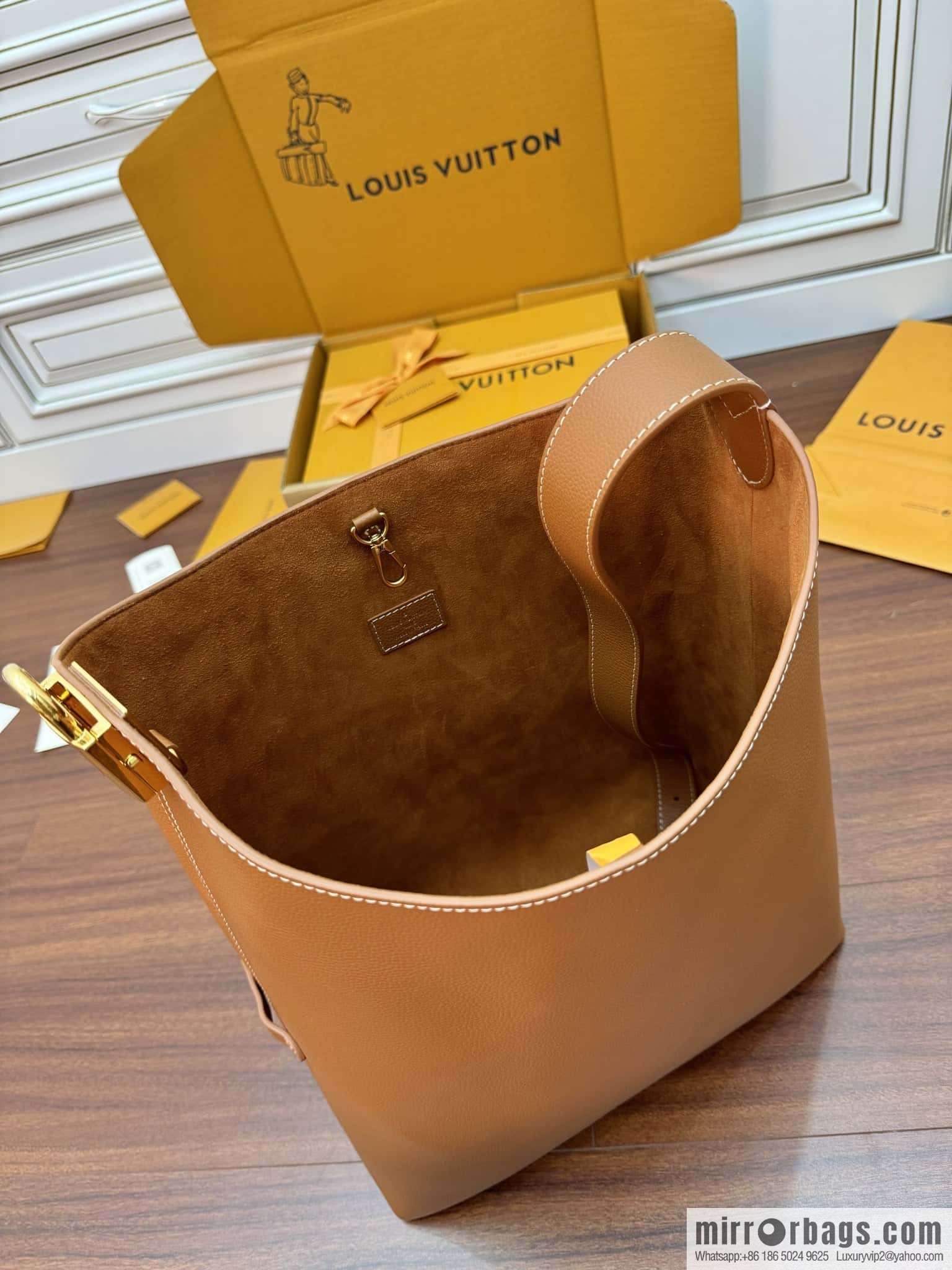 LV M24974 LOW KEY HOBO medium handbag