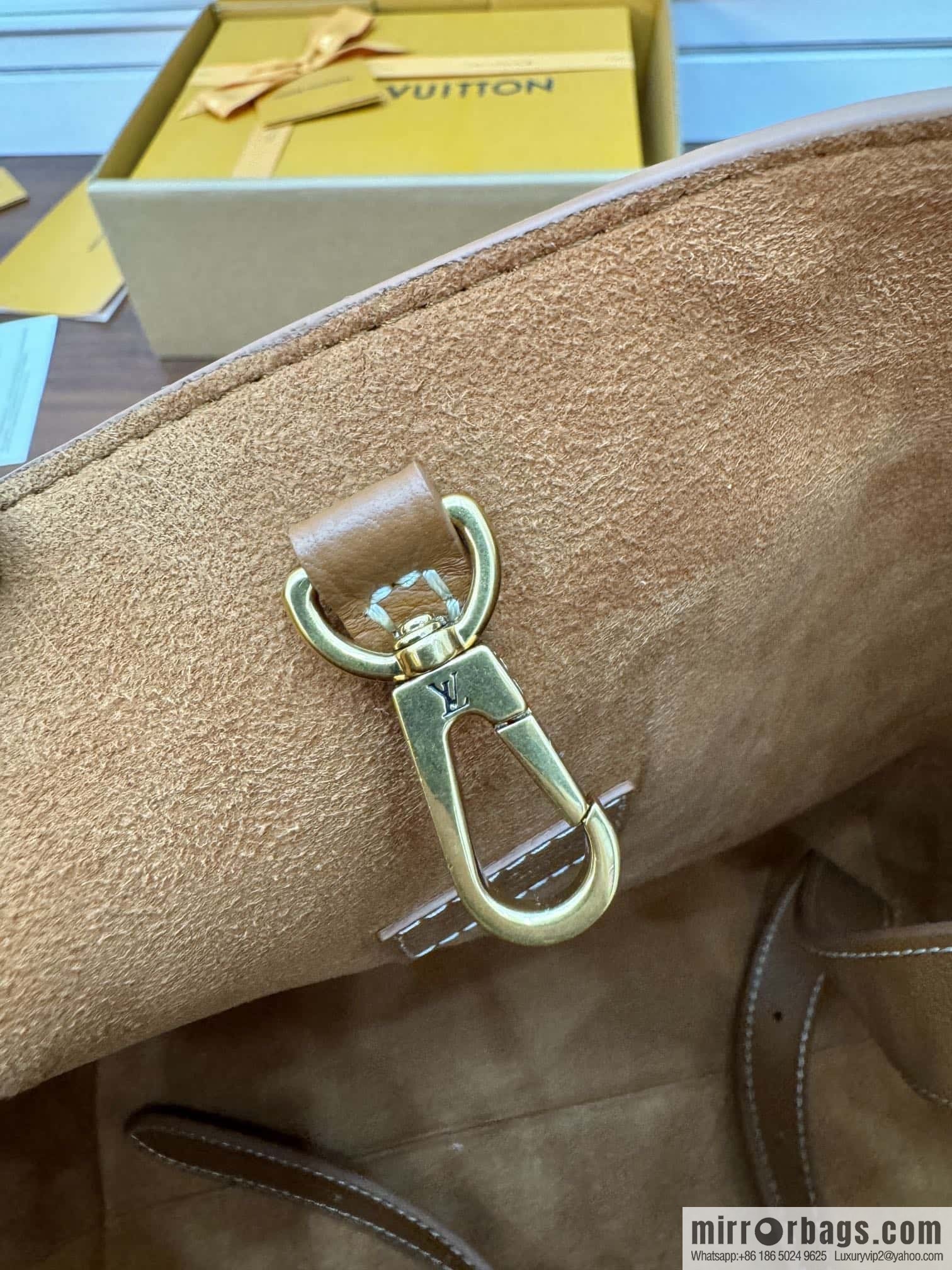 LV M24974 LOW KEY HOBO medium handbag