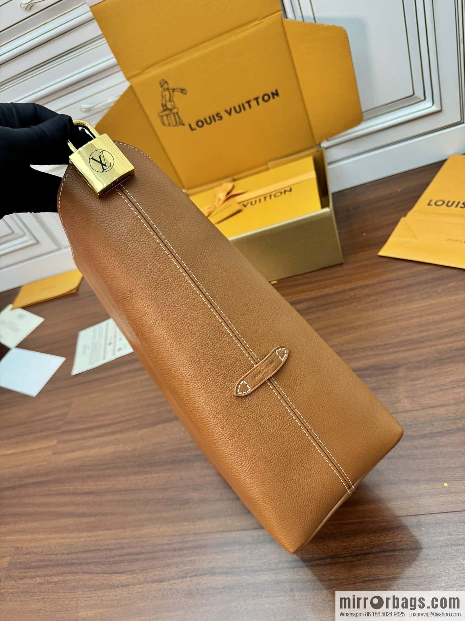 LV M24974 LOW KEY HOBO medium handbag