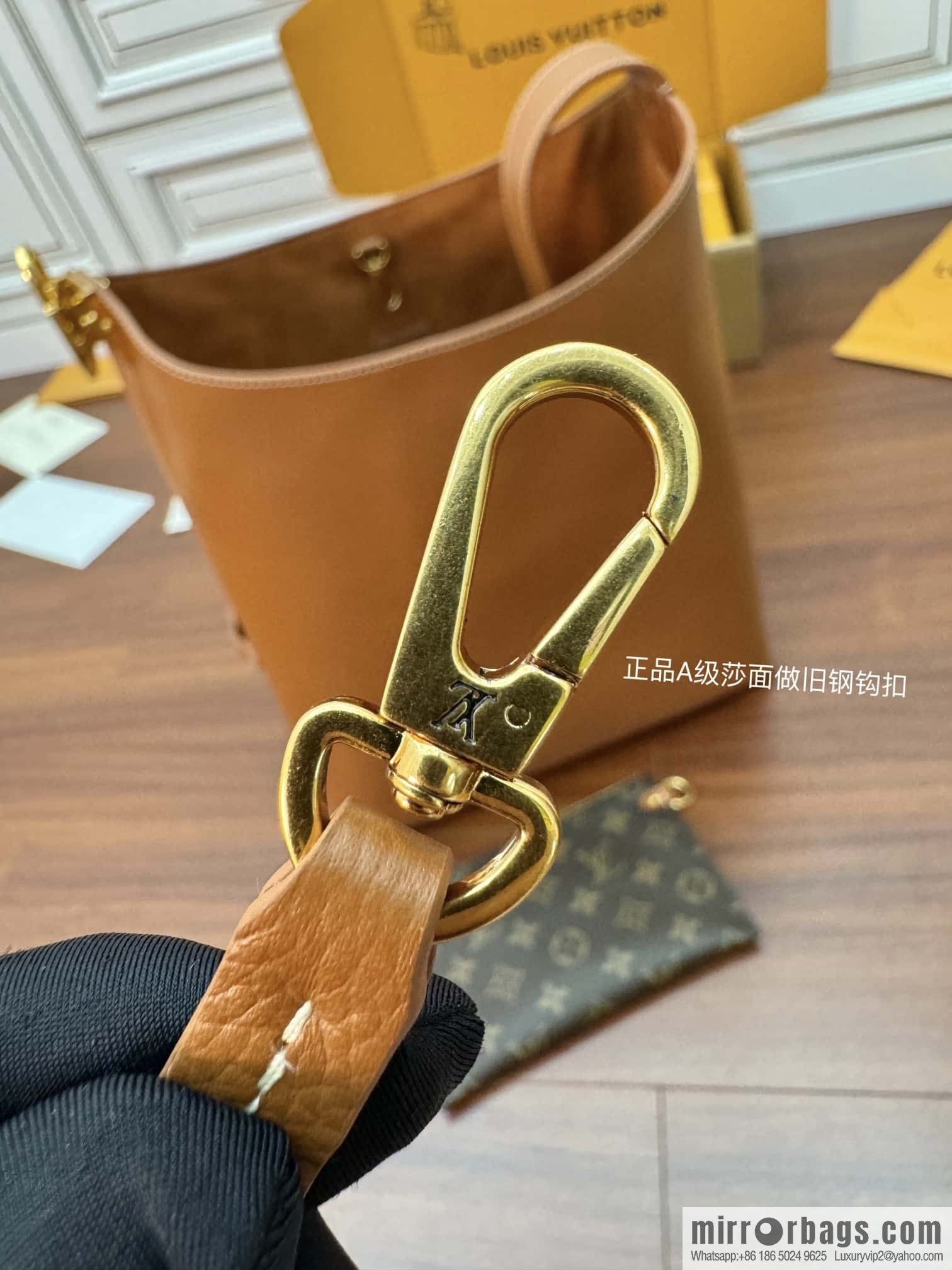 LV M24974 LOW KEY HOBO medium handbag