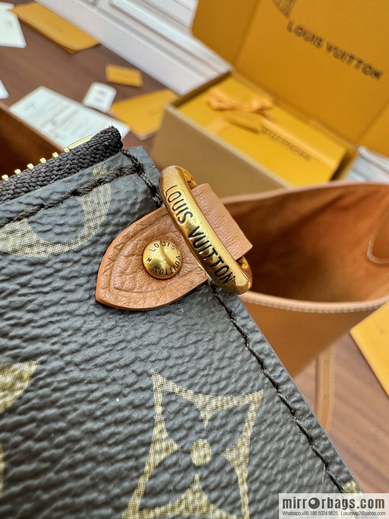 LV M24974 LOW KEY HOBO medium handbag