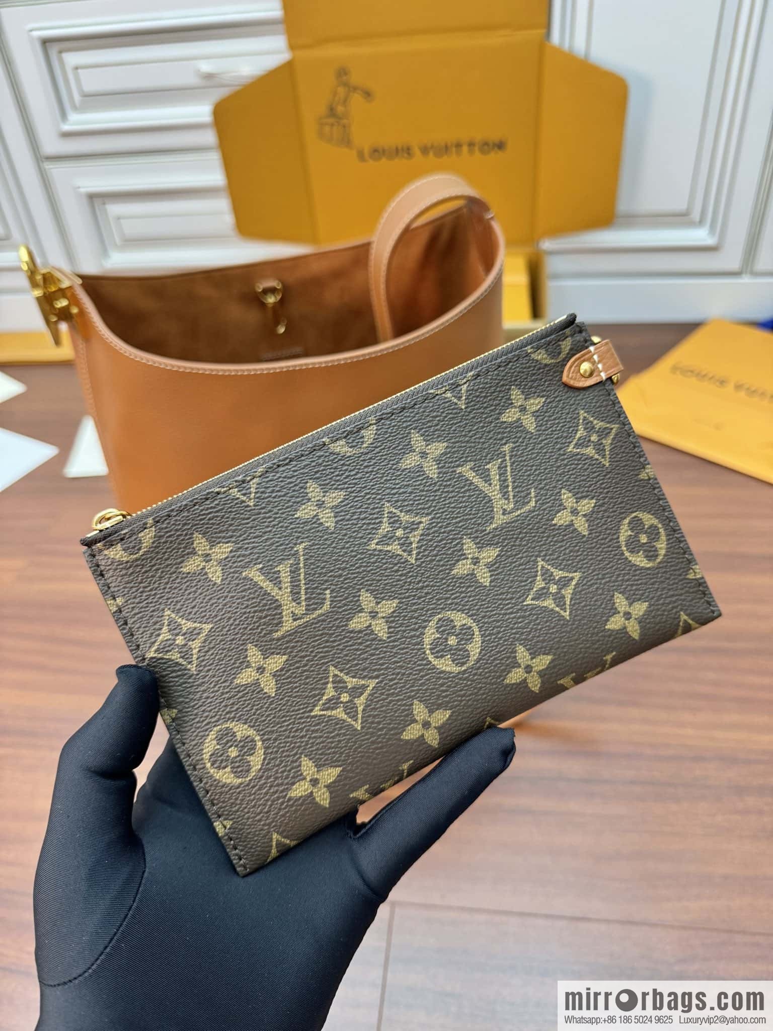 LV M24974 LOW KEY HOBO medium handbag