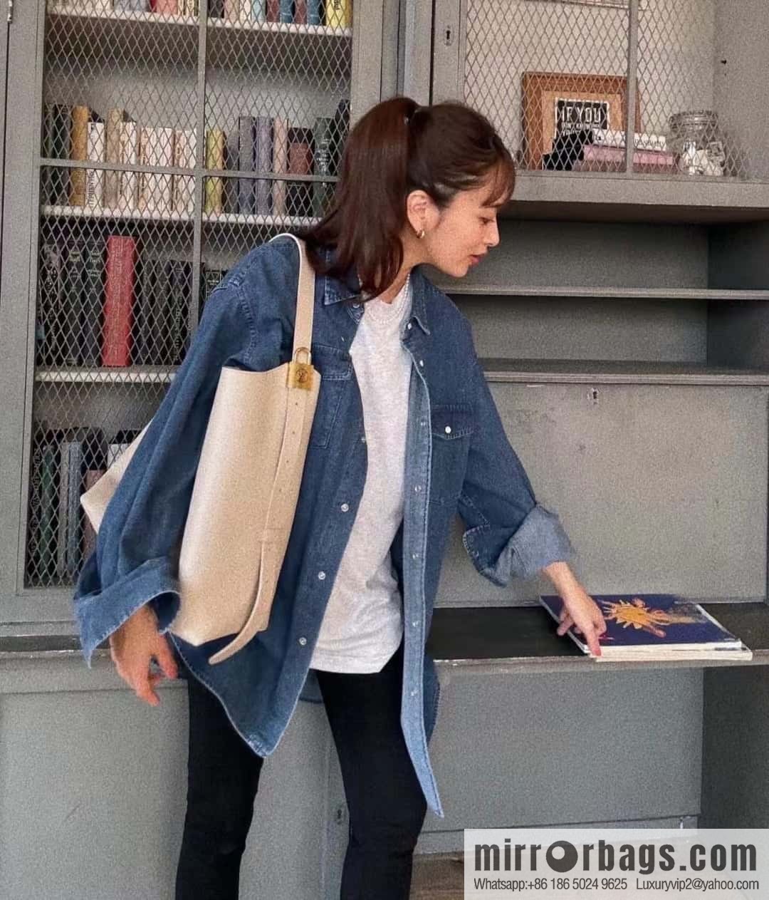 LV M25022 LOW KEY HOBO medium handbag