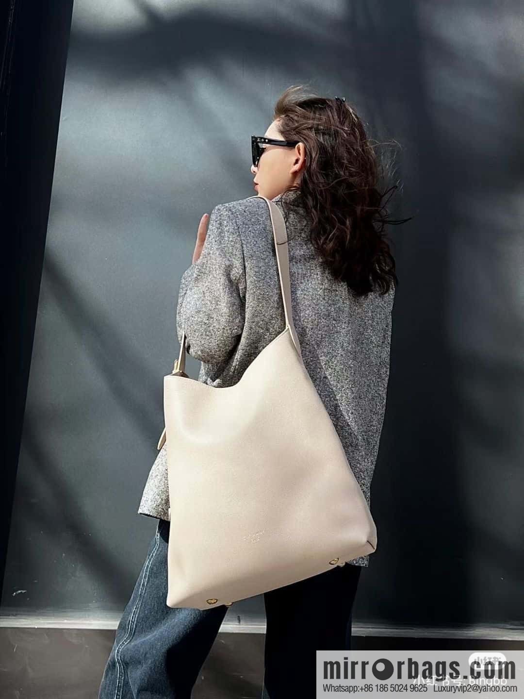 LV M25022 LOW KEY HOBO medium handbag