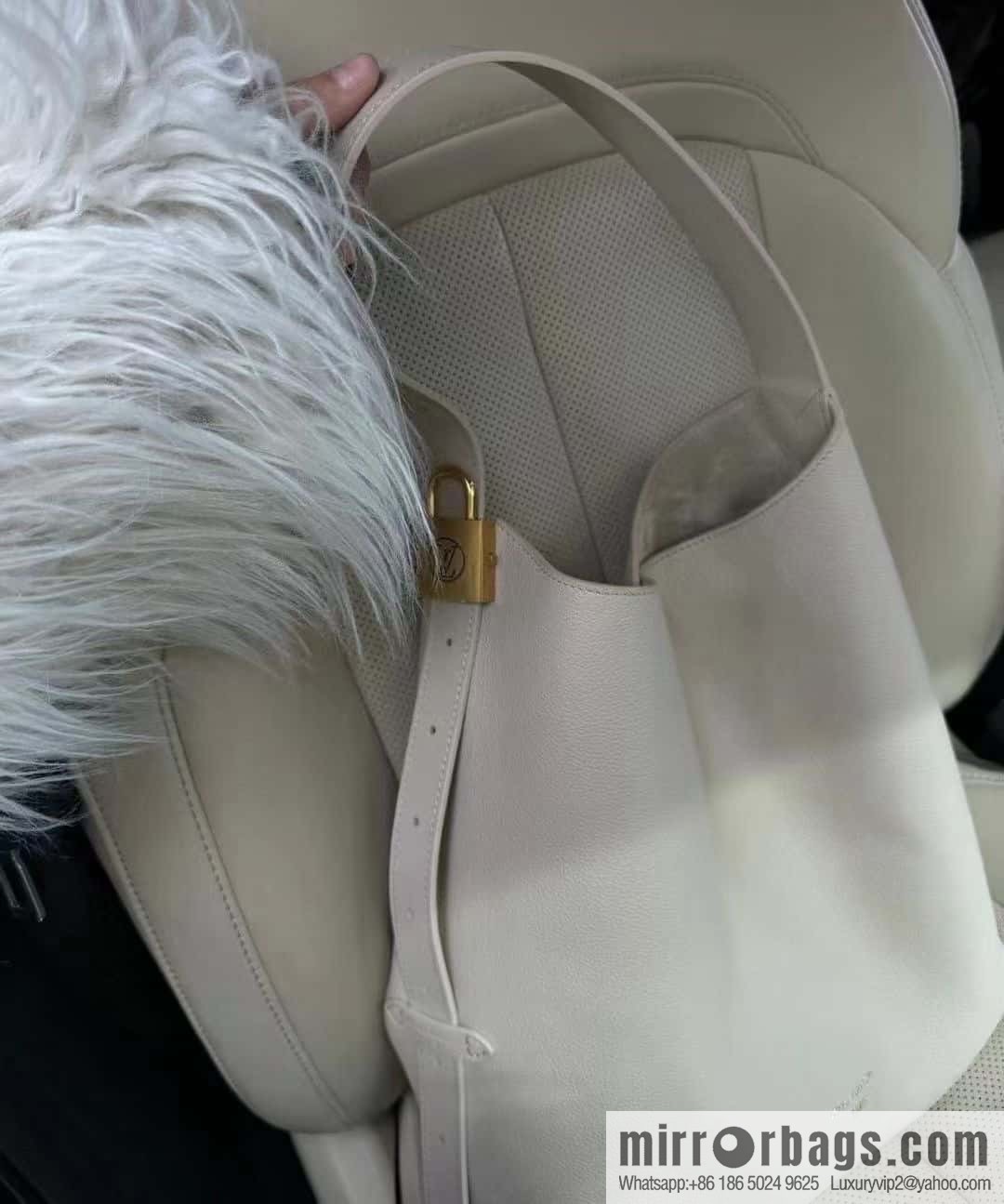 LV M25022 LOW KEY HOBO medium handbag